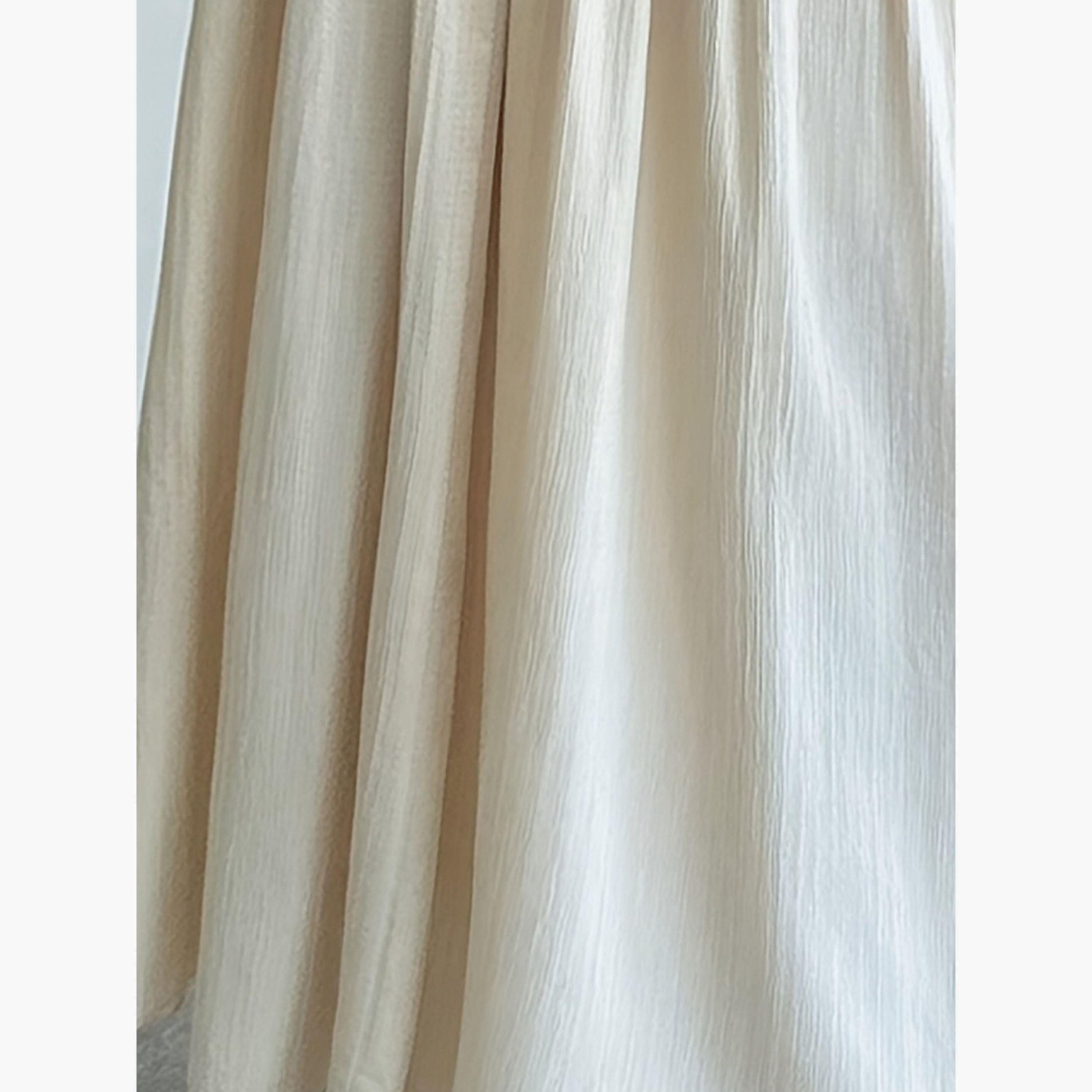 تنورة طويلة بيضاء خصر متوسط بحافة واسعة-women-clothing-bottoms-skirts-image-4