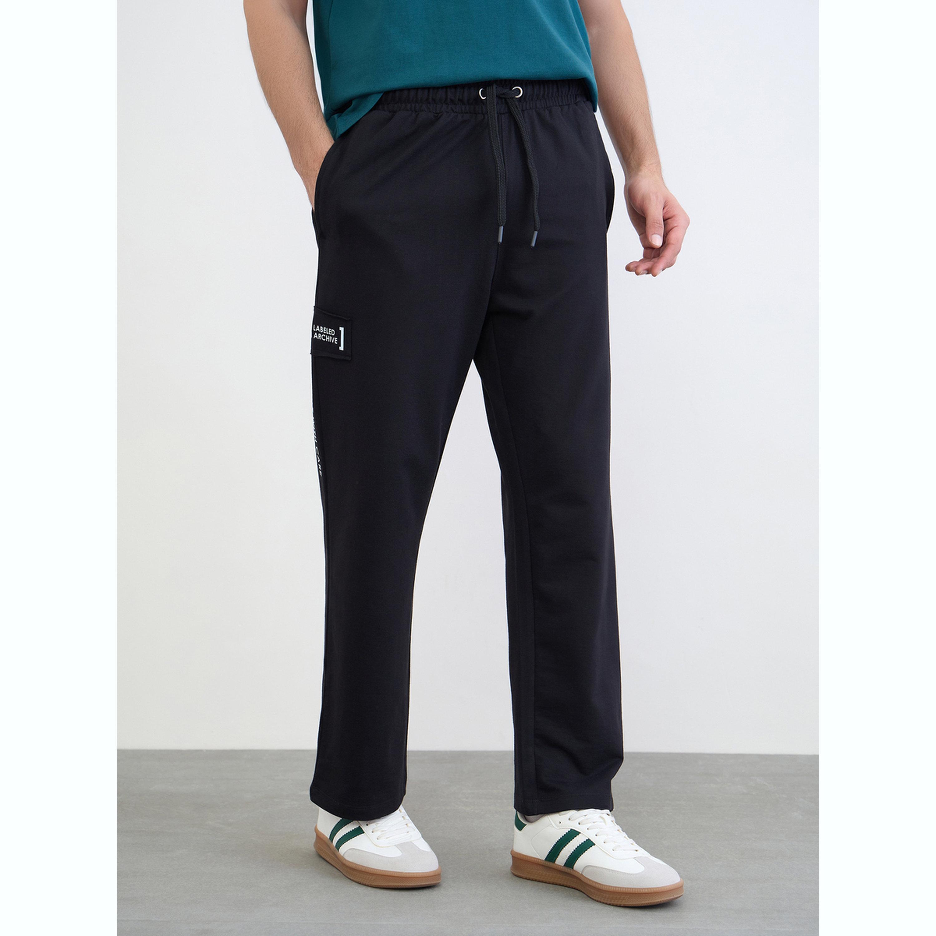 جوغر واسع بتفاصيل مرقعة بزينة-men-clothing-bottoms-joggers-image-1