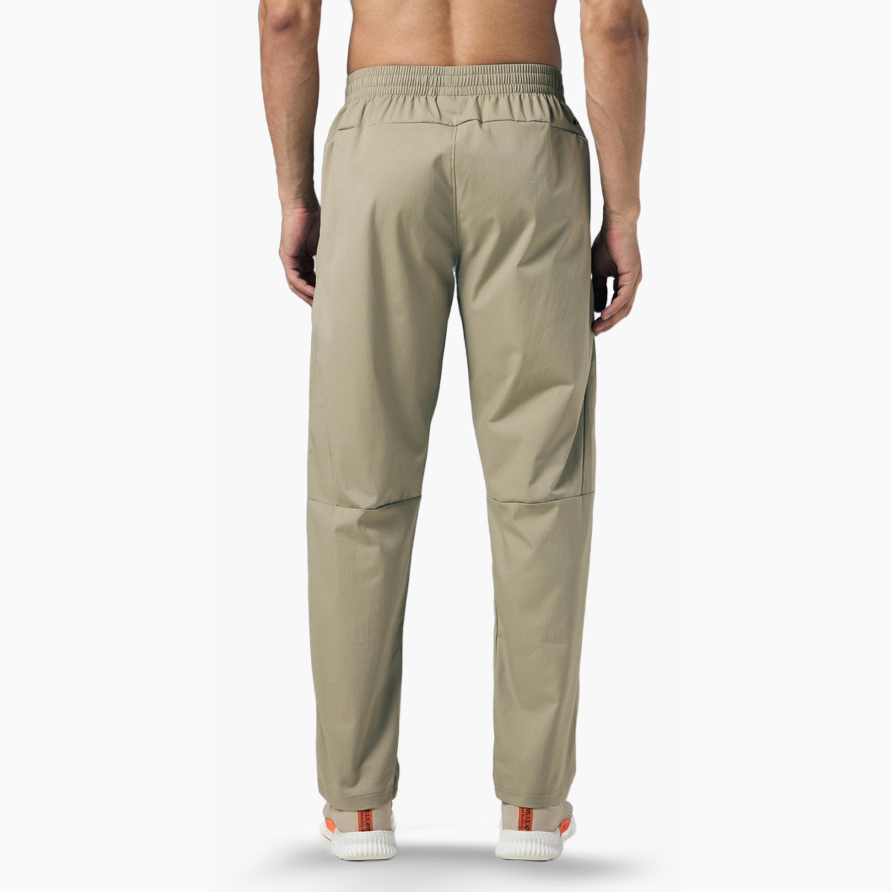 بنطال رياضي بقصة عادية للرجال وتقنية تكنوسبورت-men-clothing-sportswearandactivewear-bottoms-joggers-image-6