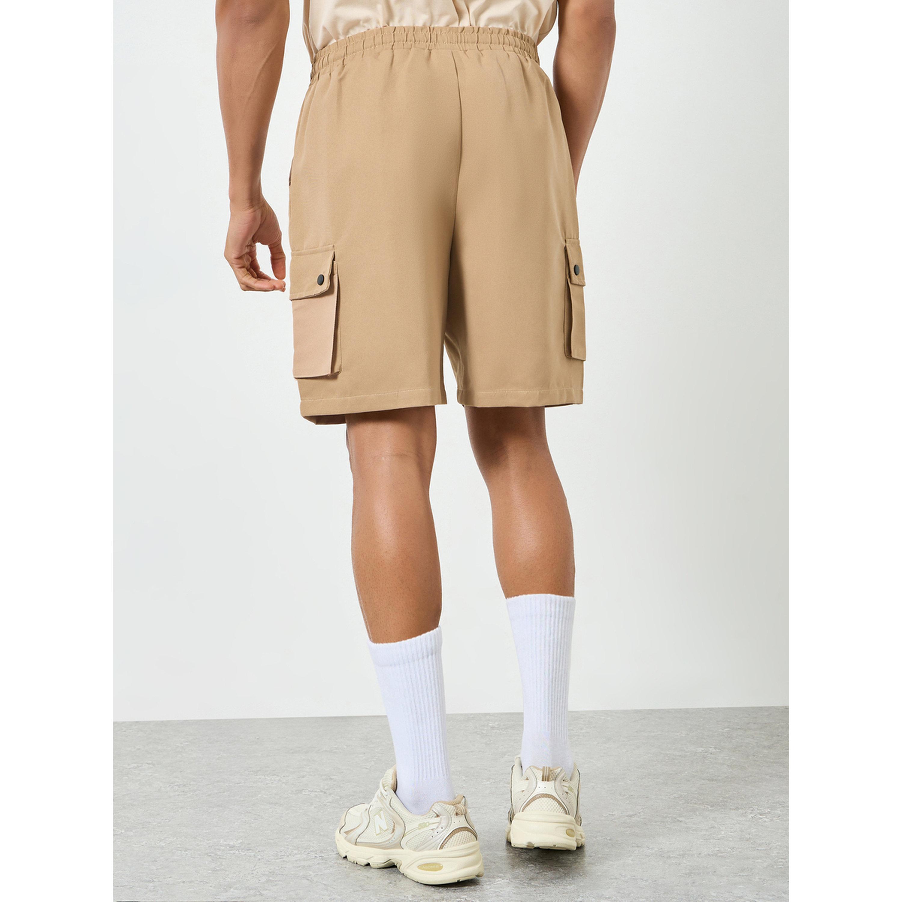 تيك تو - شورت رجالي بيج اللون بجيوب جانبية ورباط-men-clothing-swimandbeach-shorts-image-5