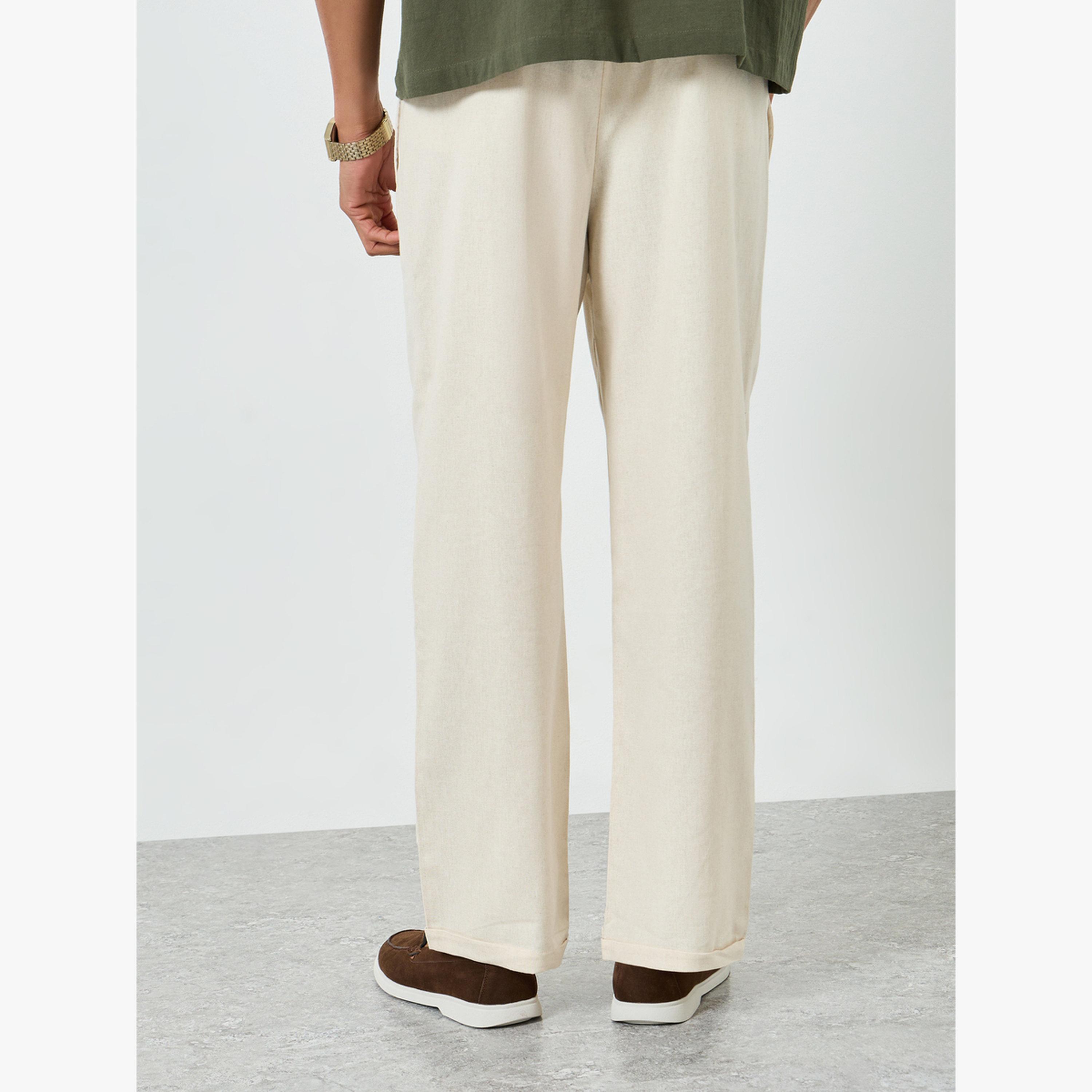 بنطال كتان بقصة بقصة مريحة-men-clothing-bottoms-joggers-image-5