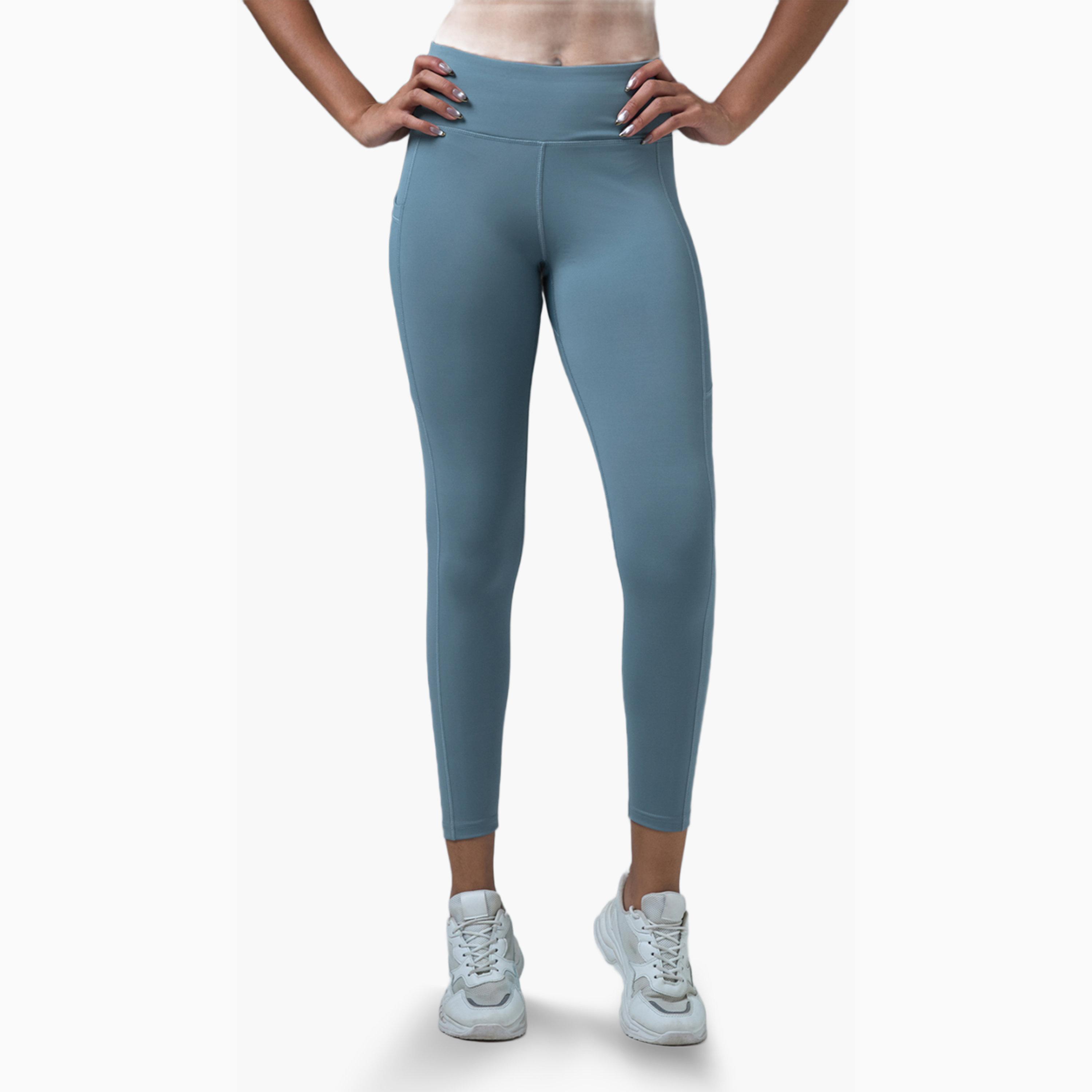 بنطال رياضي سادة بقصة ضيقة مع إيلاستو لايت-women-clothing-sportswearandactivewear-bottoms-leggings-image-1