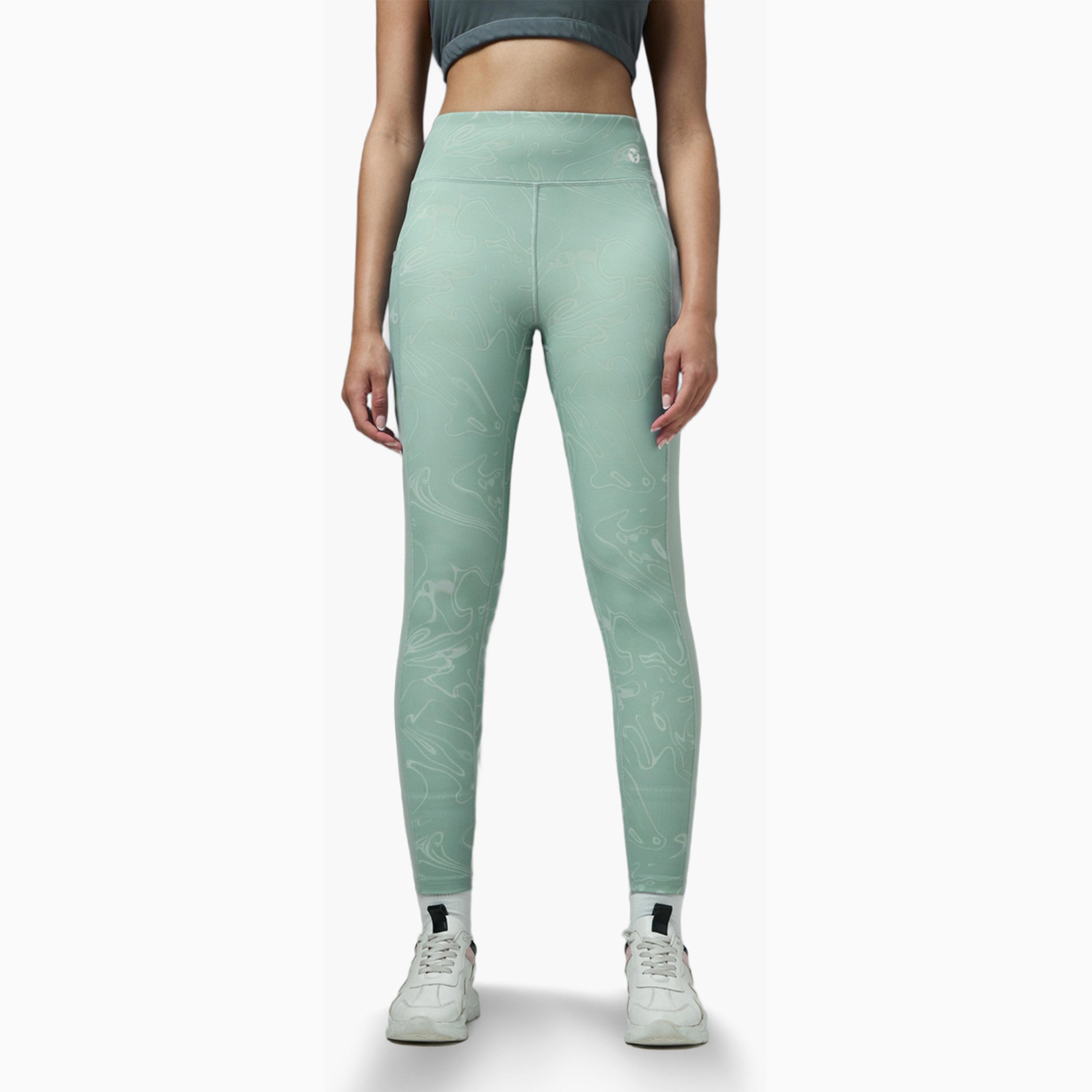ليقنز بطبعة بقصة ضيقة مع إيلاستو بلس-women-clothing-sportswearandactivewear-bottoms-leggings-image-1