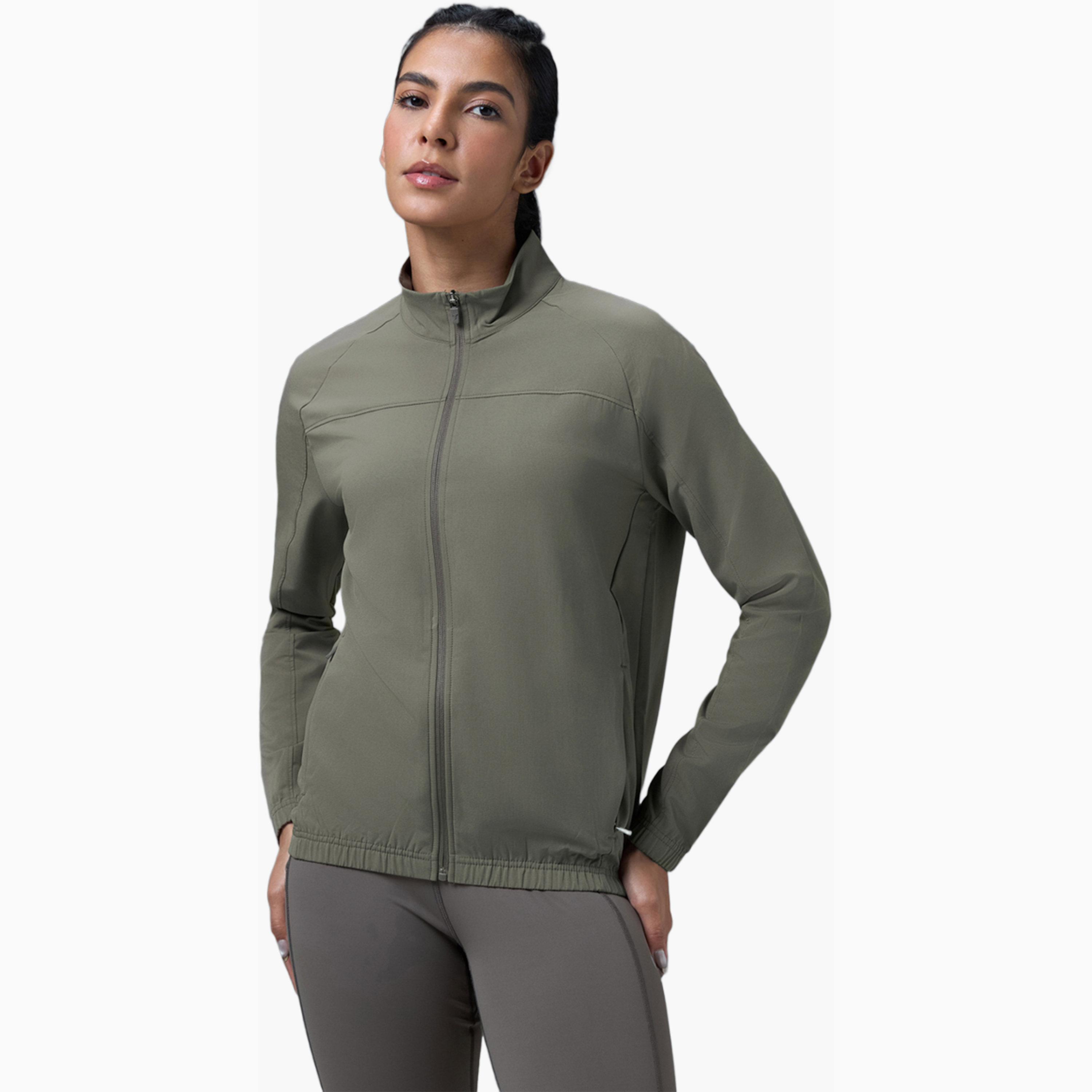 جاكيت رياضي سادة بقصة ضيقة وتقنية تكنولايت-women-clothing-sportswearandactivewear-coatsandjackets-jackets-image-1