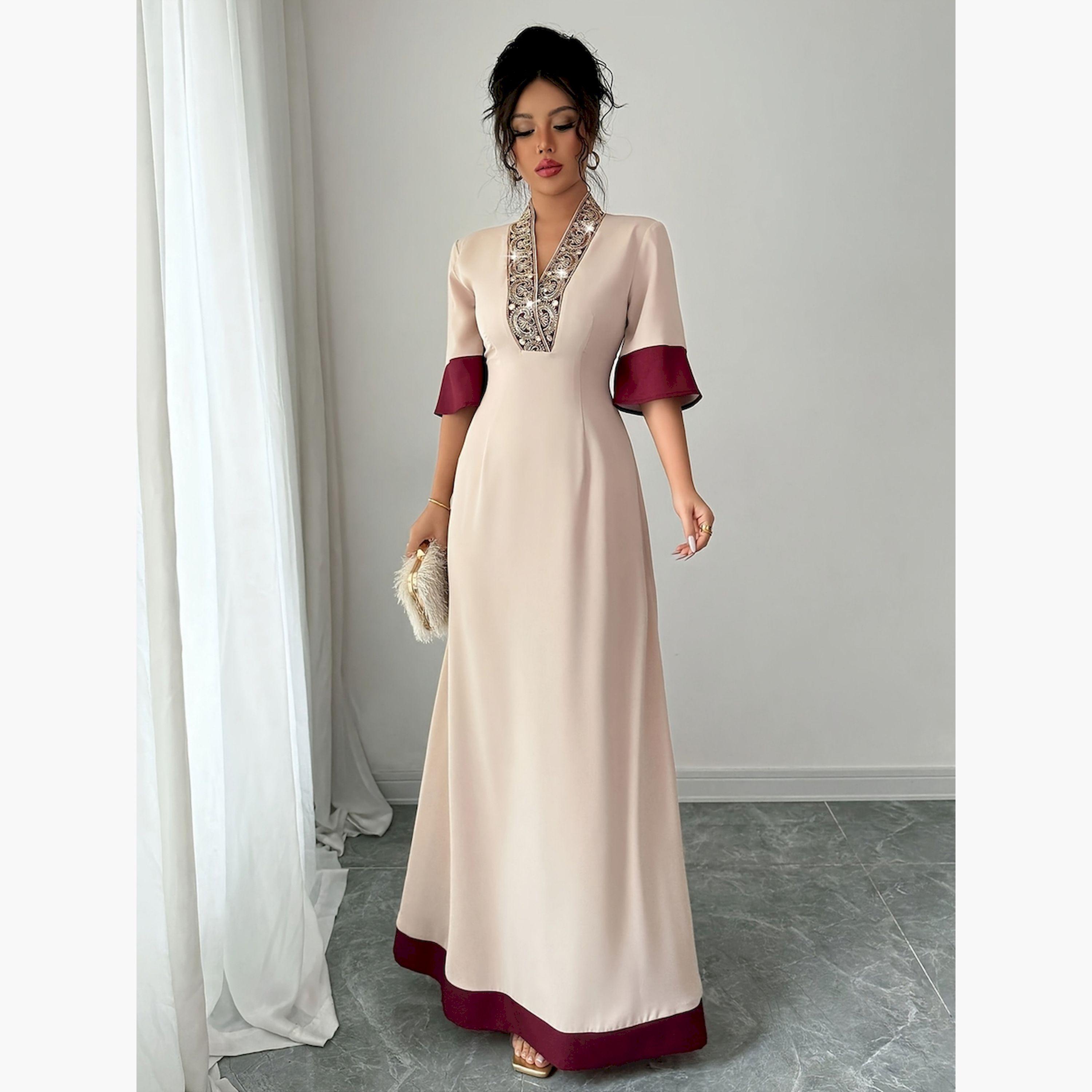 فستان طويل بحافة واسعة وحواف متباينة وتفاصيل مزينة-women-clothing-dresses-image-1