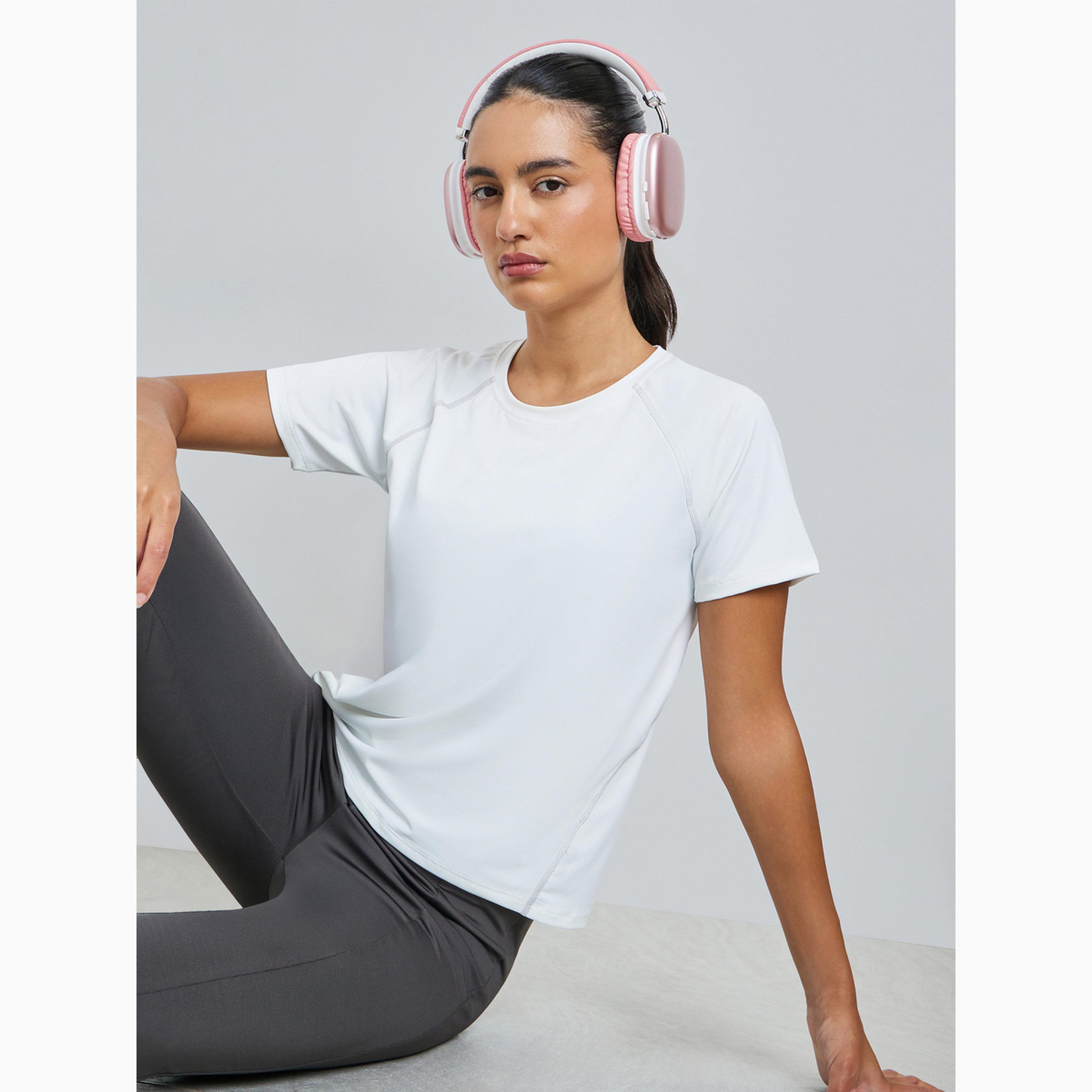 بلوزة بأكمام قصيرة وتفاصيل درزات من نفس اللون لون أبيض-sports-women-clothing-tshirtsandvests-image-3
