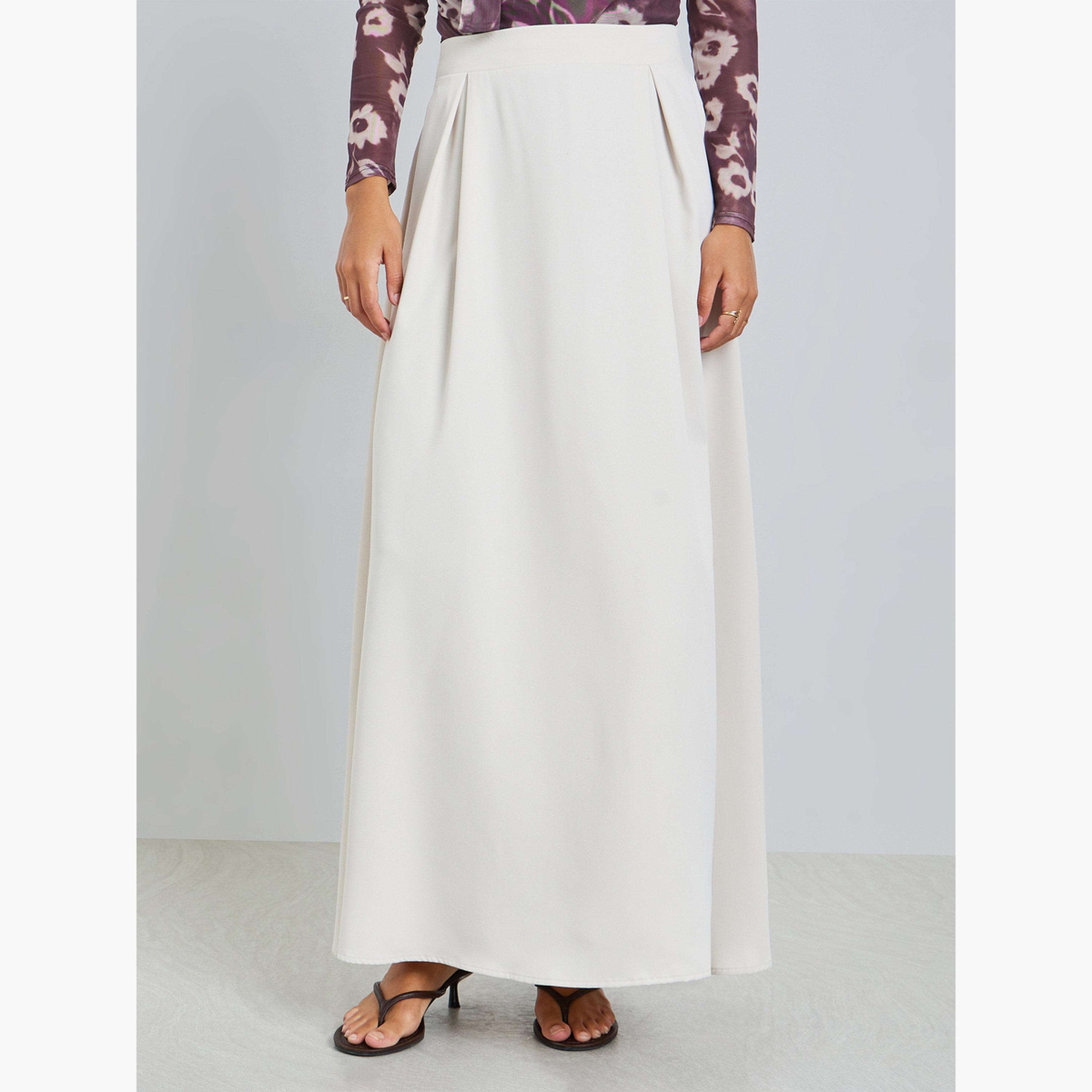 تنورة طويلة بحافة واسعة وكسرات مطوية-women-clothing-skirts-image-1