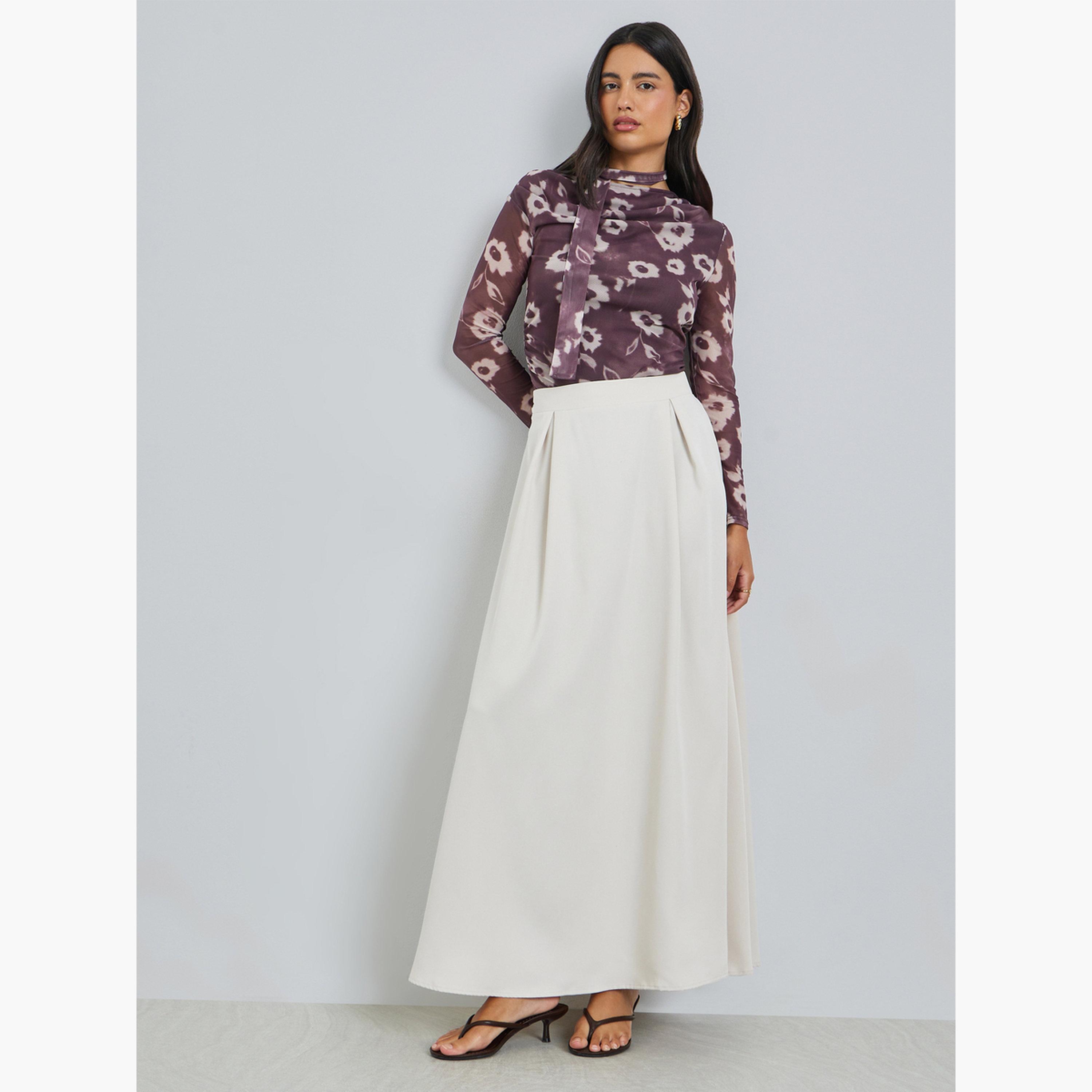 تنورة طويلة بحافة واسعة وكسرات مطوية-women-clothing-skirts-image-2