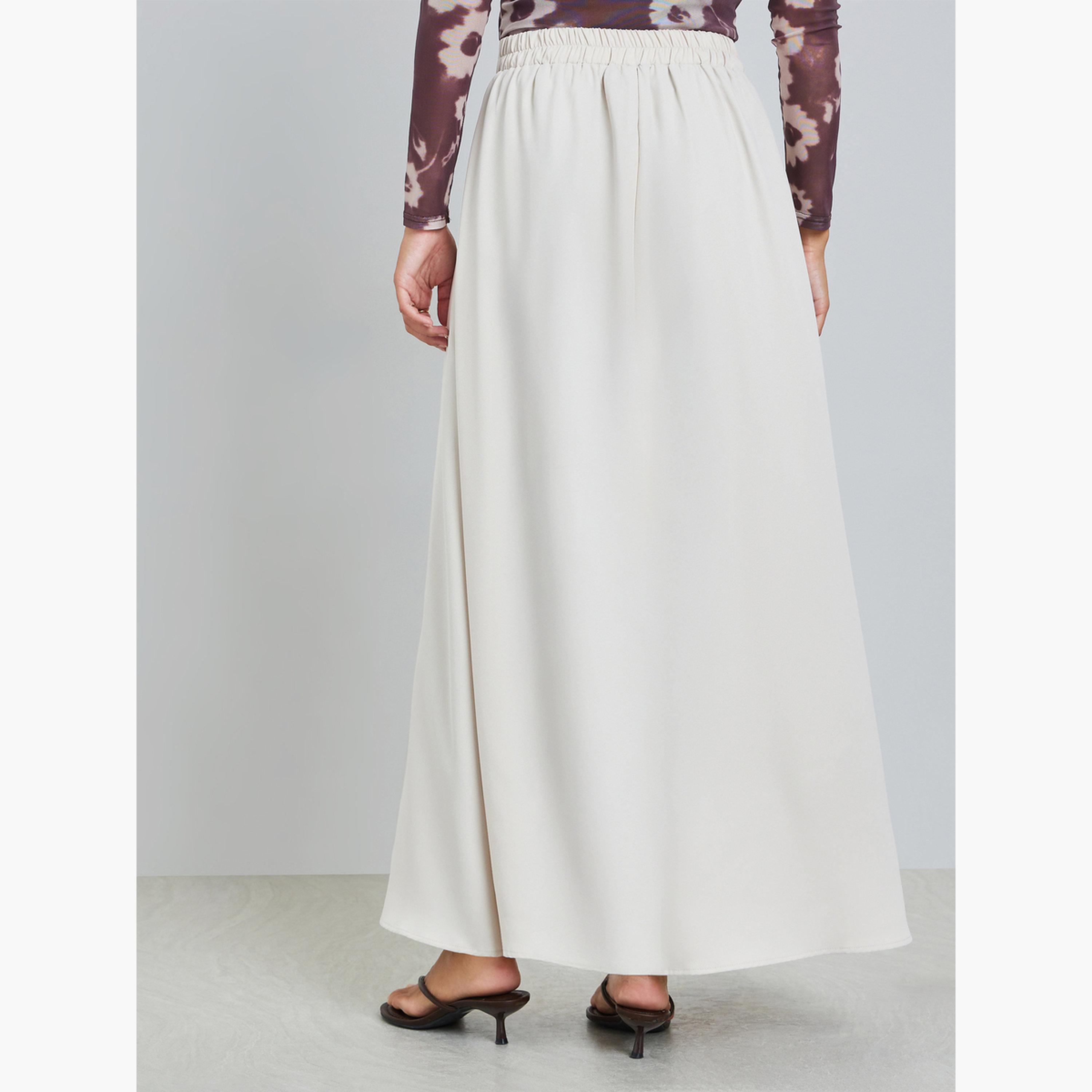 تنورة طويلة بحافة واسعة وكسرات مطوية-women-clothing-skirts-image-4