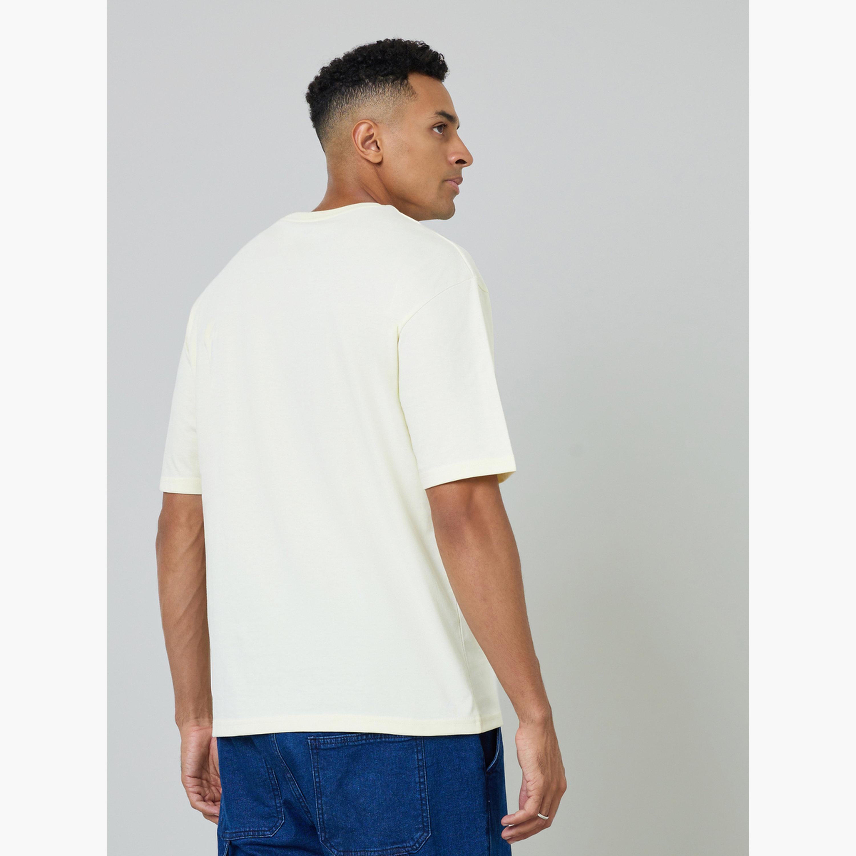 تيشيرت جيرسي بقصة فضفاضة وطبعة جرافيك للرجال-men-clothing-tshirtsandpolos-tshirts-image-4