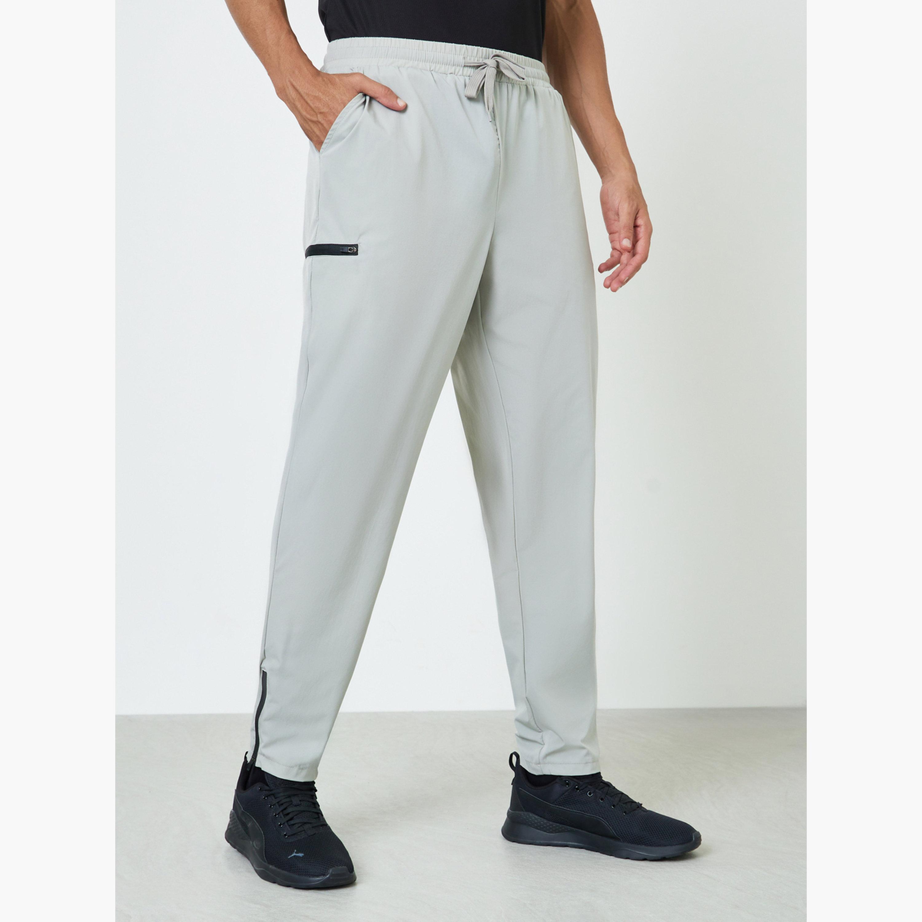 بنطال تمرين بجيب بسحاب للرجال-men-clothing-sportswearandactivewear-bottoms-image-1
