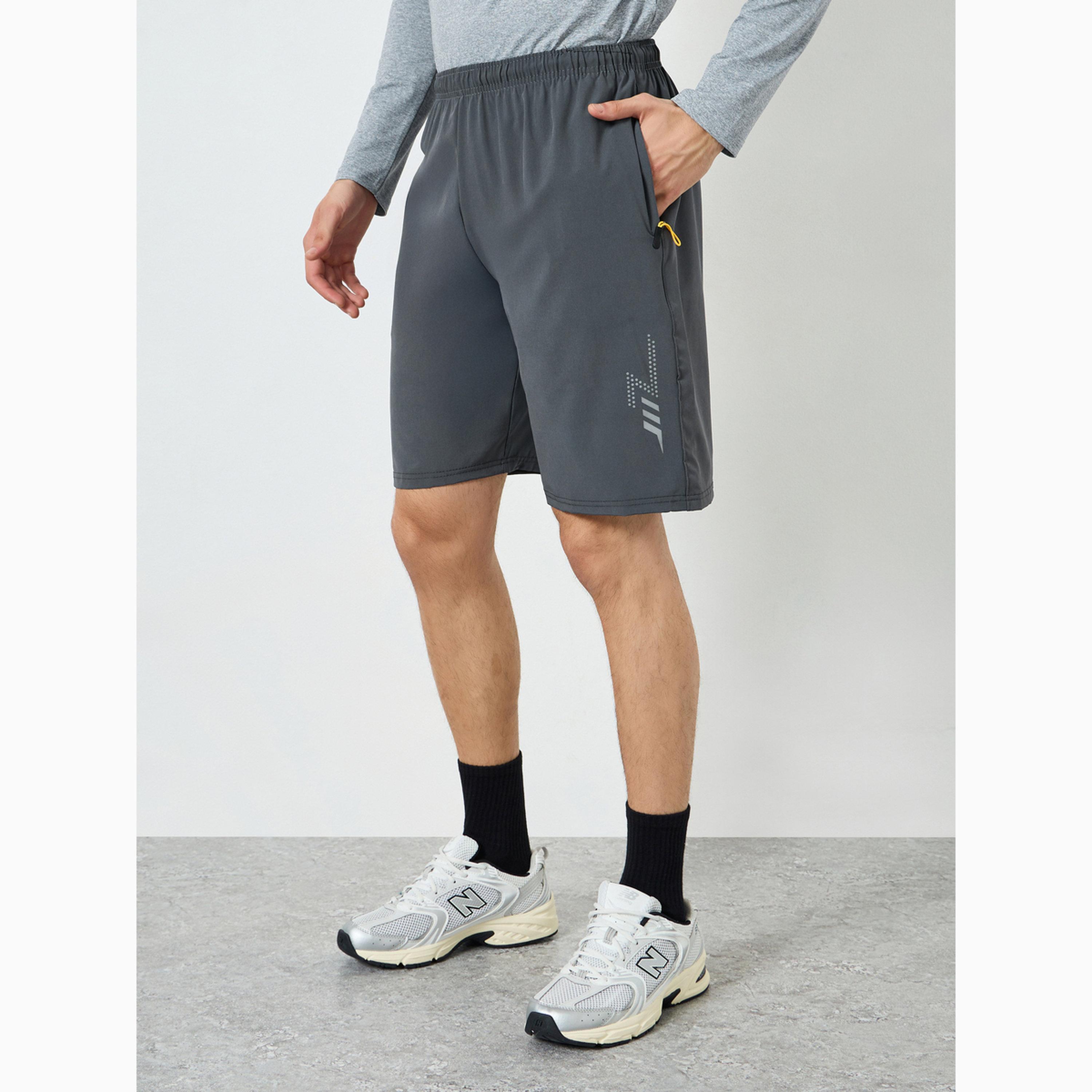 شورت تدريب رياضي بجيوب بسحاب للرجال-men-clothing-bottoms-shorts-image-1