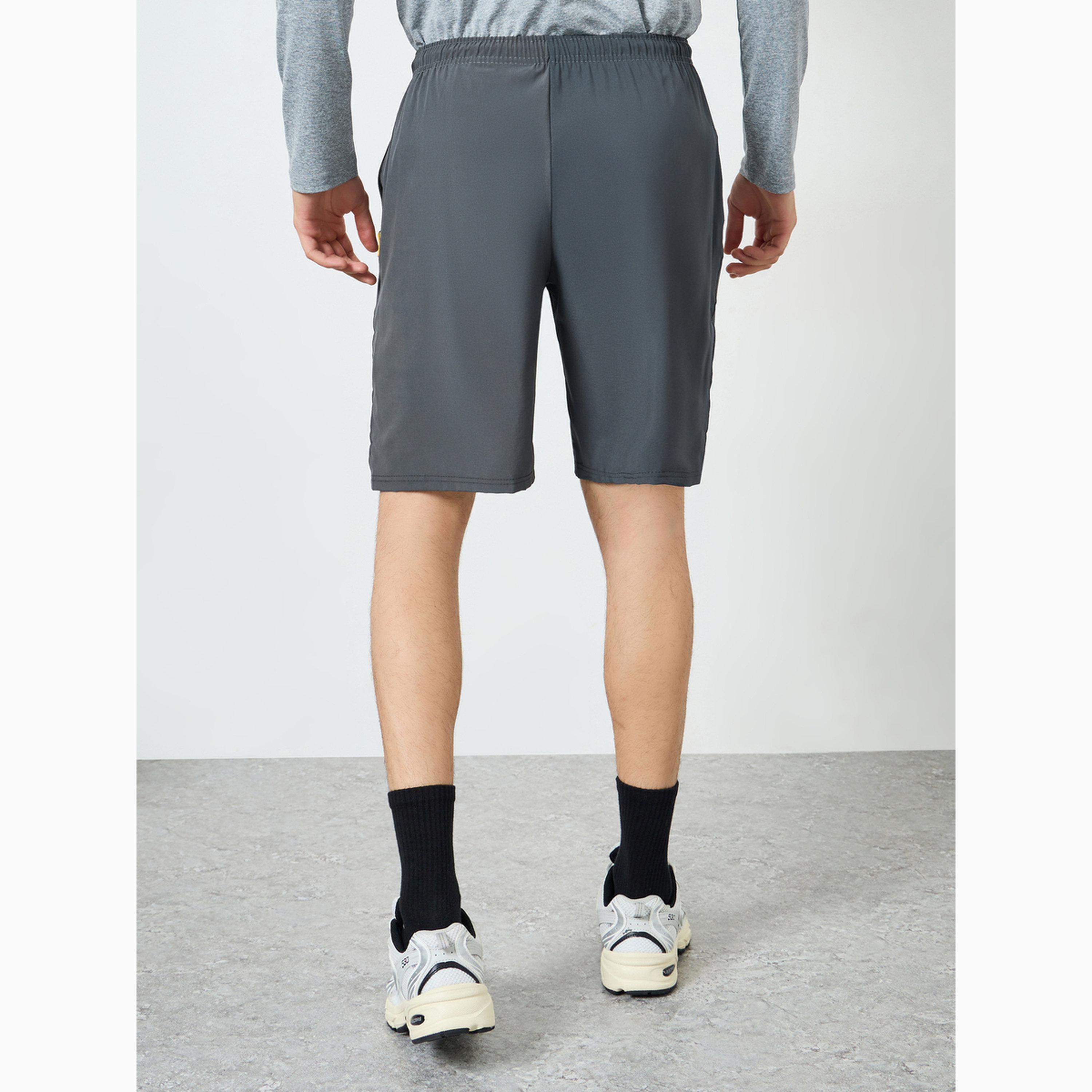 شورت تدريب رياضي بجيوب بسحاب للرجال-men-clothing-bottoms-shorts-image-4