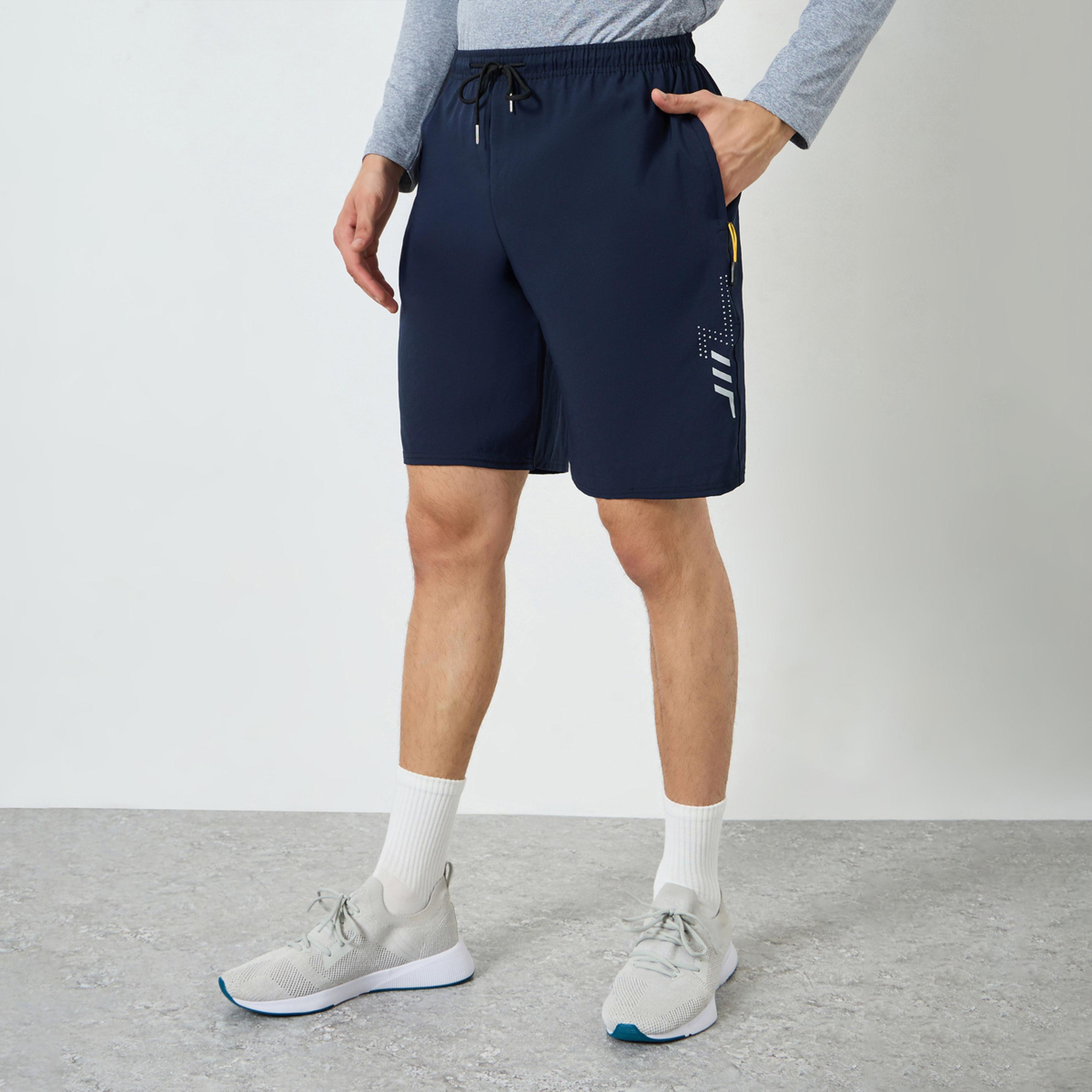 شورت تدريب رياضي بجيوب بسحاب للرجال-men-clothing-bottoms-shorts-image-1