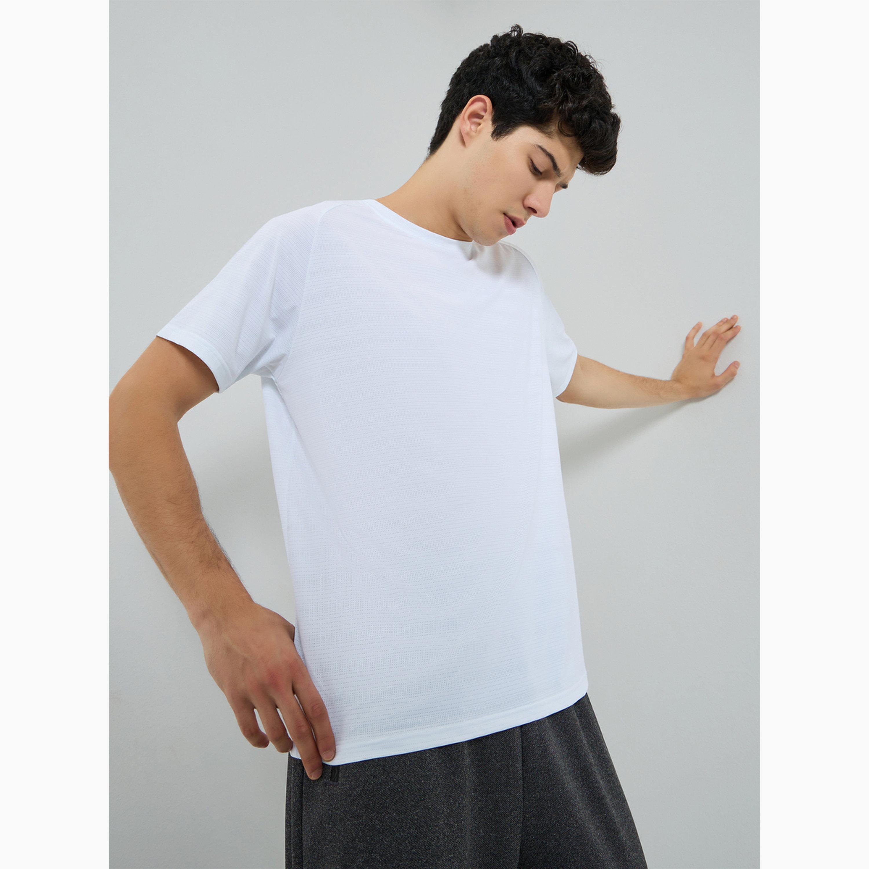 تيشيرت رياضي بأكمام راجلان للرجال-men-clothing-sportswearandactivewear-tshirtsandpolos-image-1
