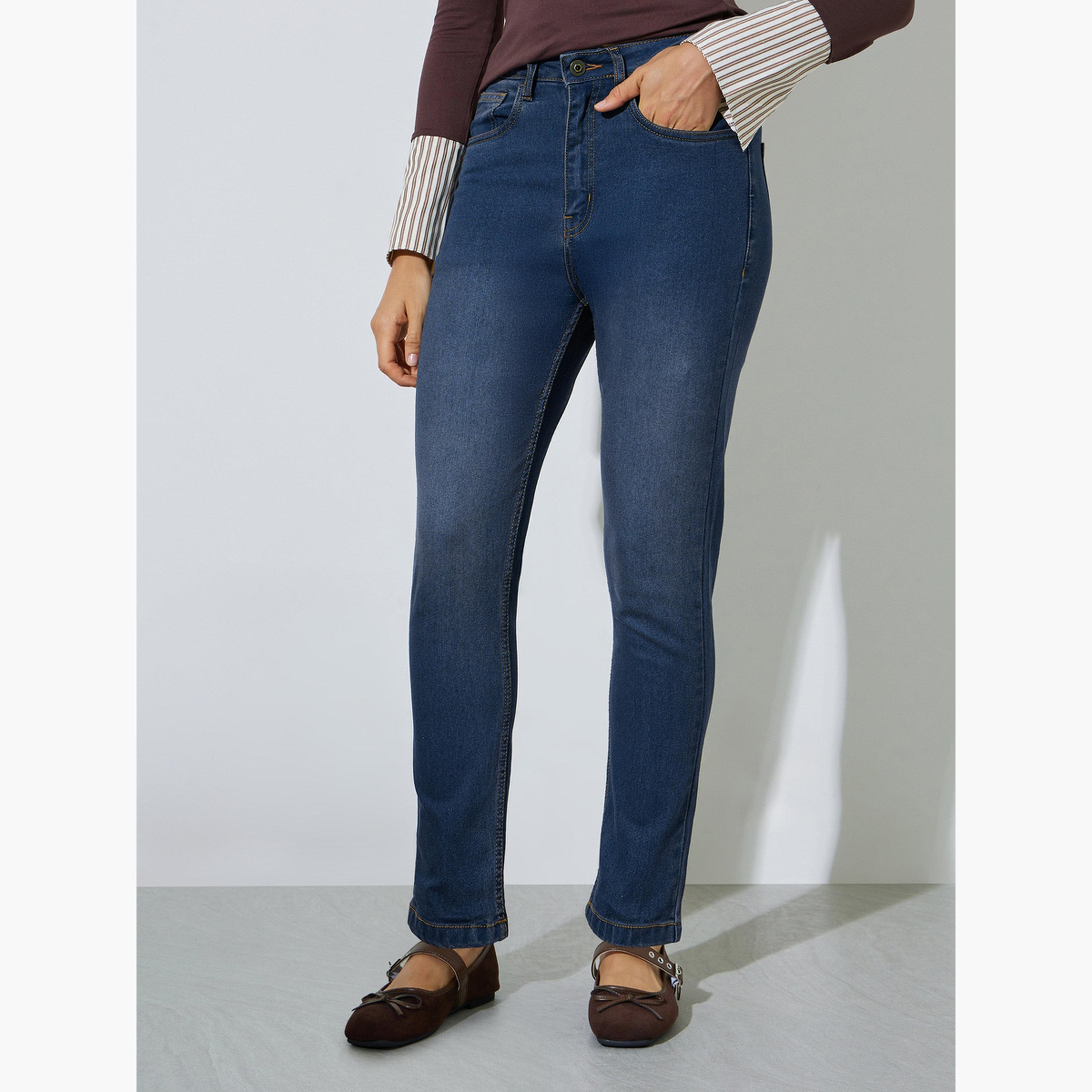 جينز بقصة ضيقة وطول الكاحل بغسيل باهت وخصر متوسط-women-clothing-jeans-image-1
