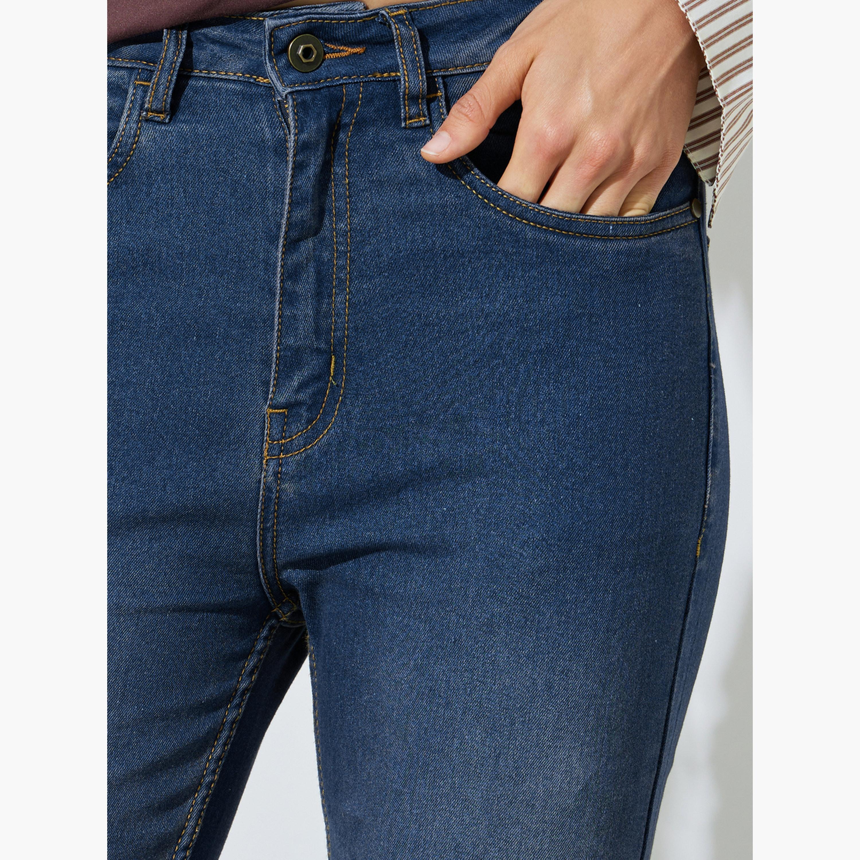 جينز بقصة ضيقة وطول الكاحل بغسيل باهت وخصر متوسط-women-clothing-jeans-image-3