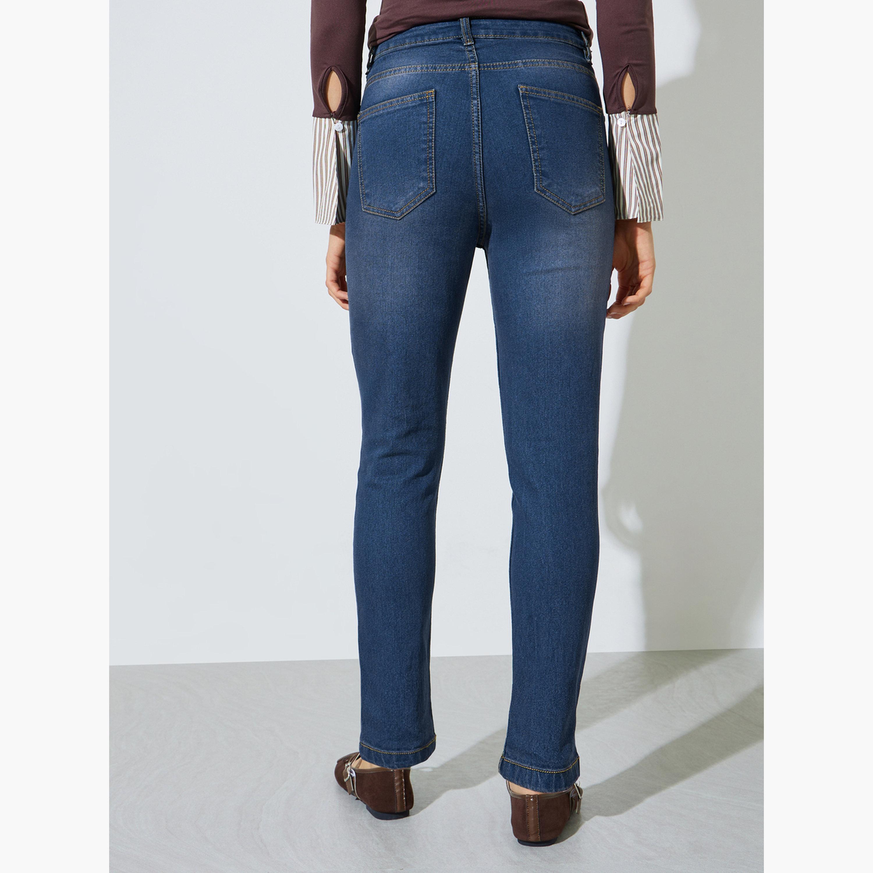 جينز بقصة ضيقة وطول الكاحل بغسيل باهت وخصر متوسط-women-clothing-jeans-image-4