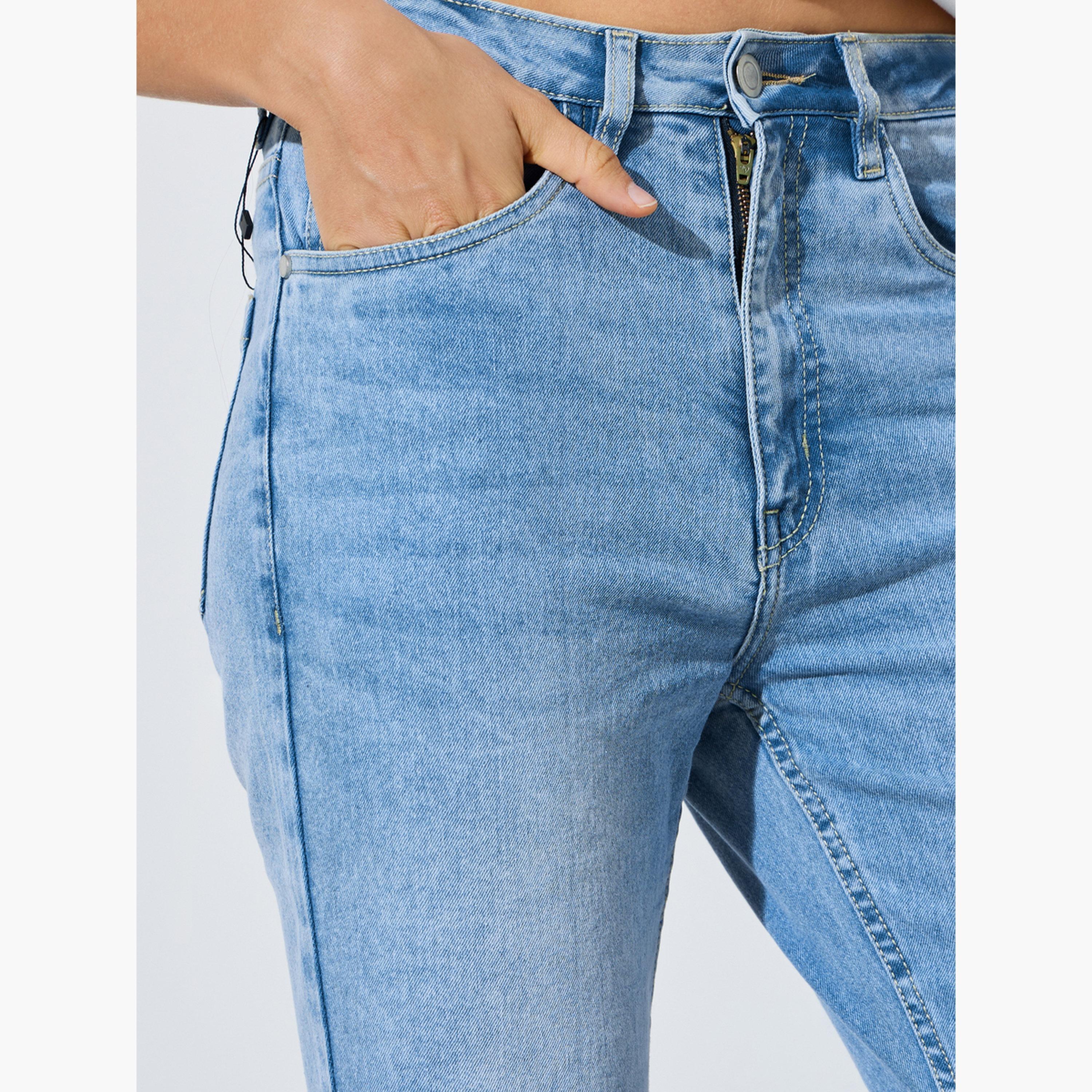 جينز بقصة ممتدة ومرن بغسيل باهت وخصر متوسط-women-clothing-jeans-image-3