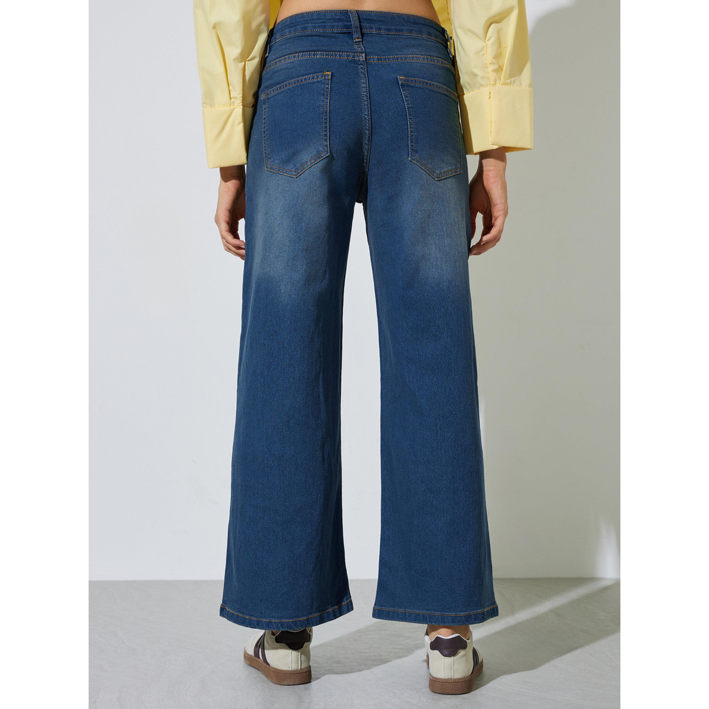 جينز بأرجل واسعة بلمسة مغسولة ودرزات مرصعة-women-clothing-jeans-image-3