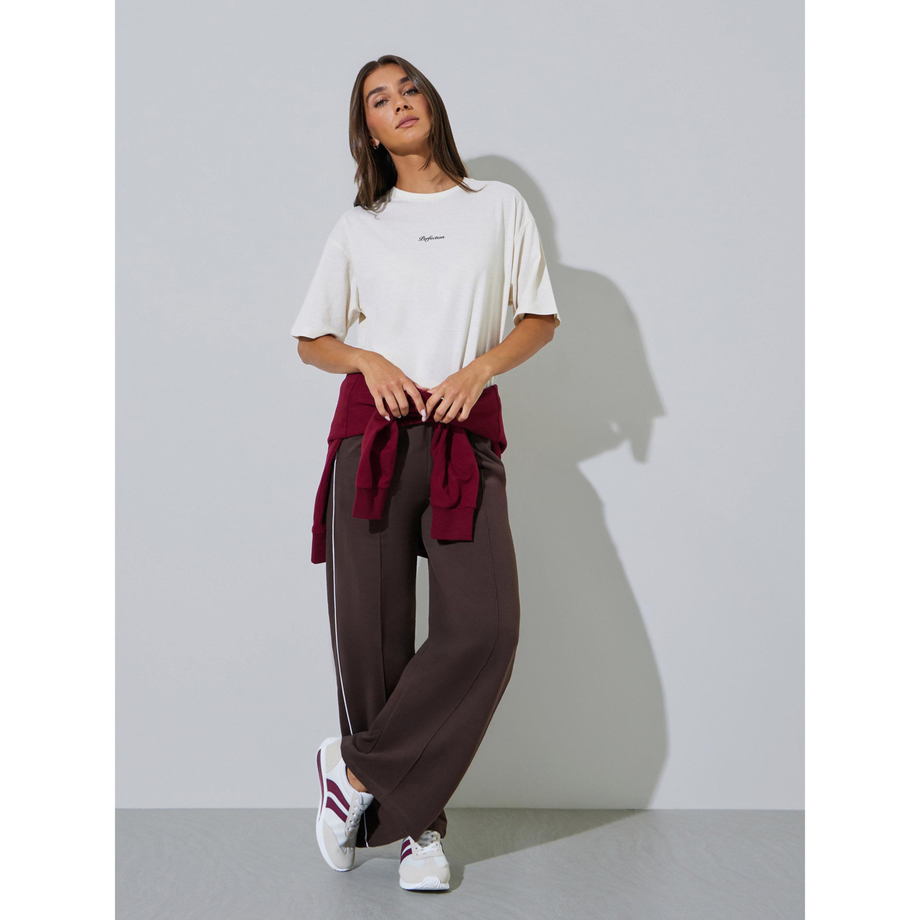 تيشيرت واسع بطبعة كتابة وأكمام قصيرة-women-clothing-tshirts-image-2