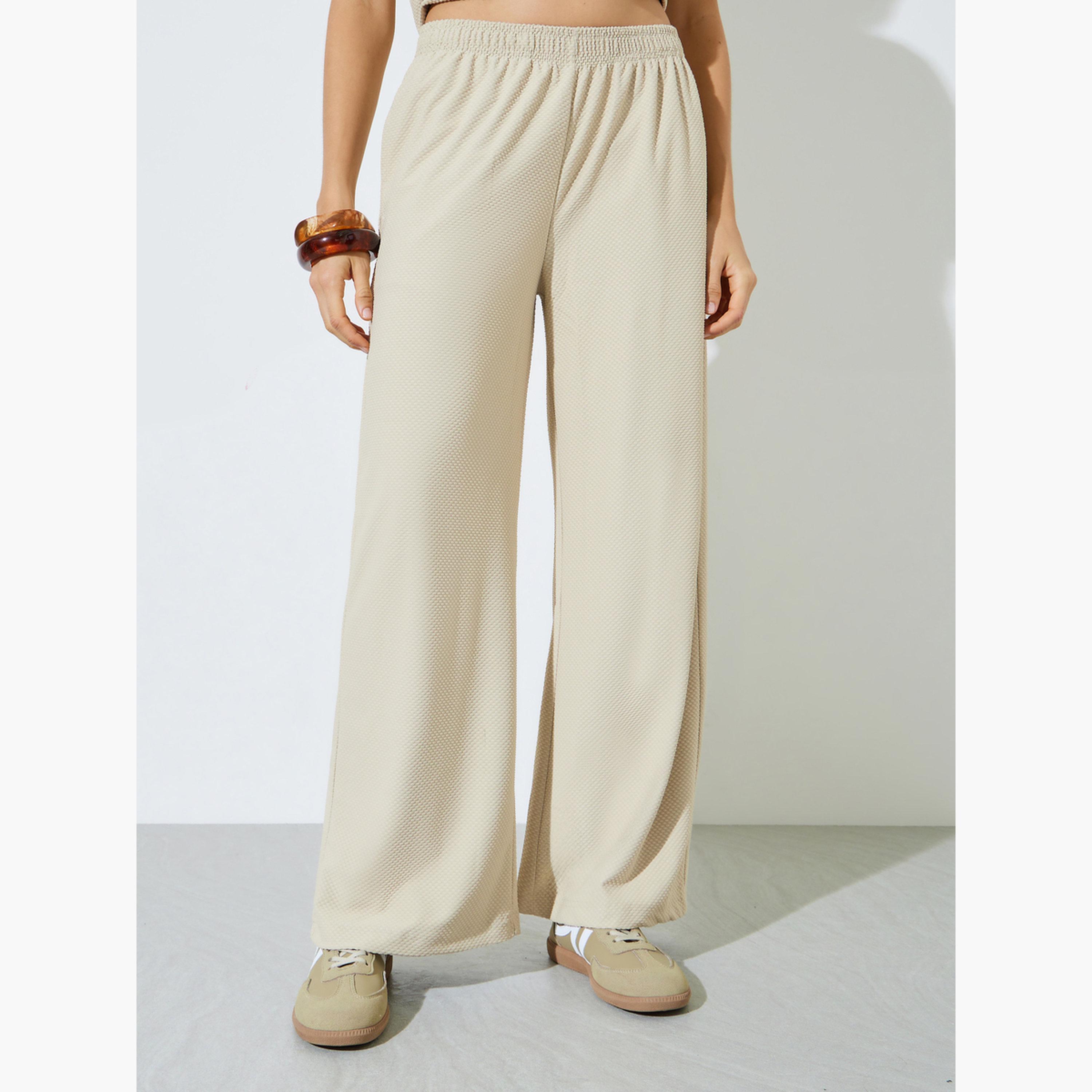 Styli Cream Textured Wide Leg Pants with Elastic Waistband-women-clothing-bottoms-joggers-image-1