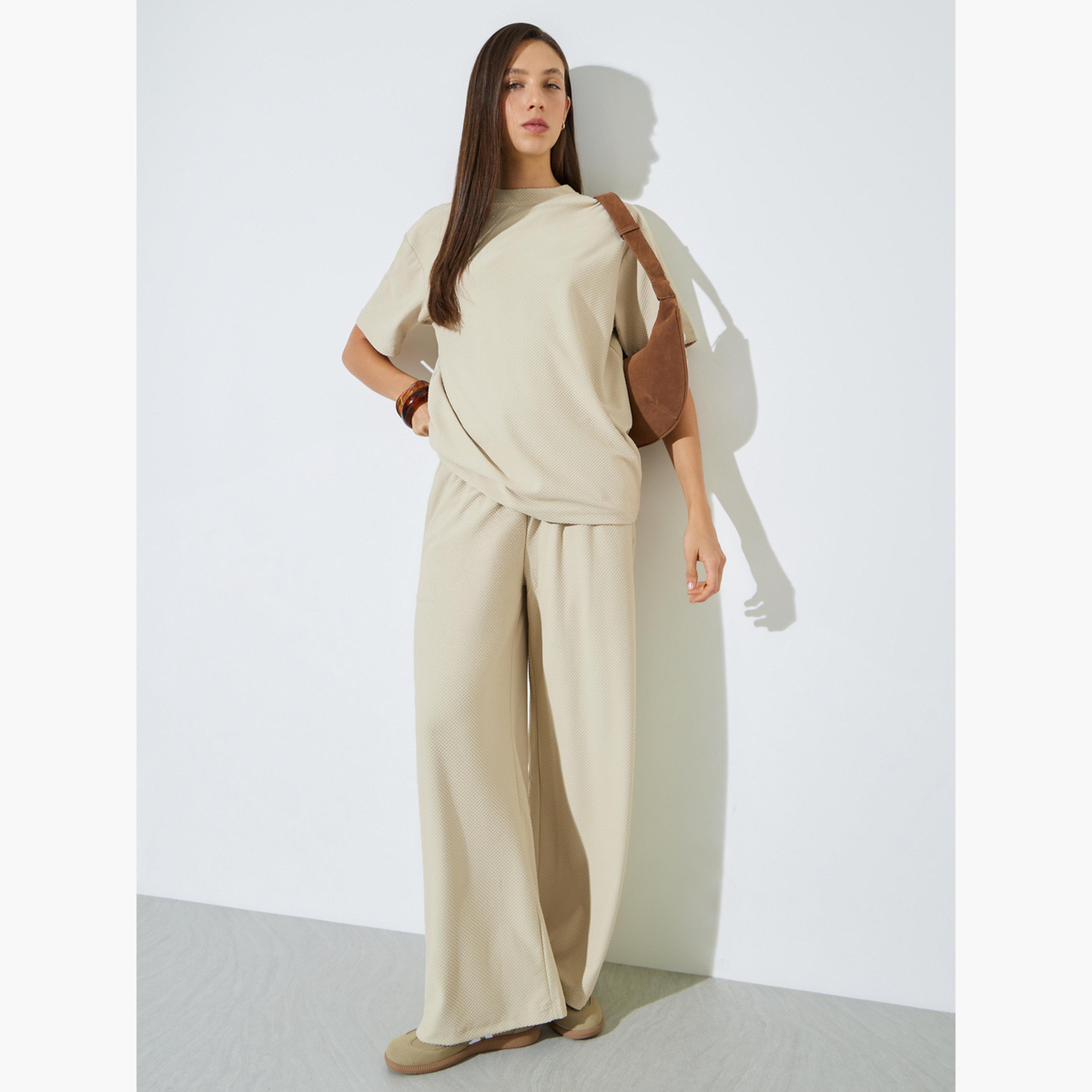 Styli Cream Textured Wide Leg Pants with Elastic Waistband-women-clothing-bottoms-joggers-image-2