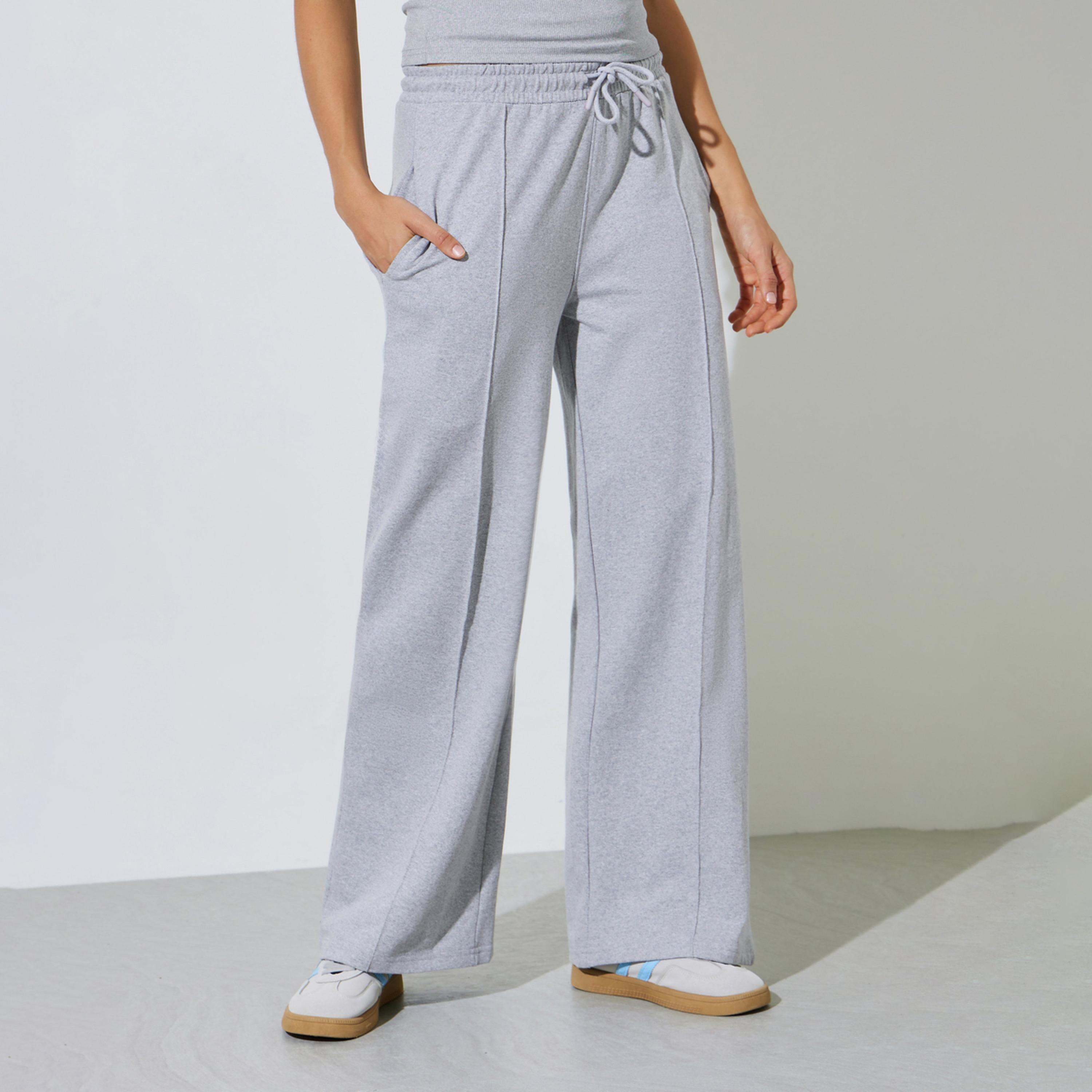 جوغر سادة بأرجل واسعة مع حزام خصر برباط-women-clothing-joggers-image-1