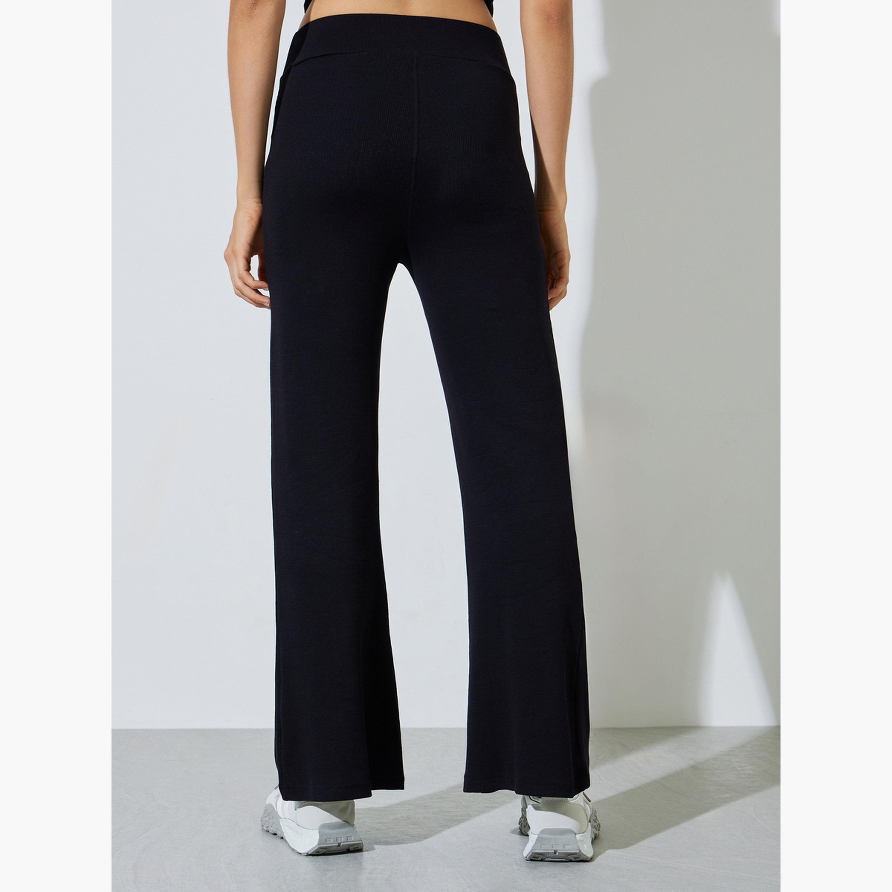 ليقنز بتصميم واسع من الأسفل بلون سادة لون أسود-women-clothing-bottoms-leggings-image-4
