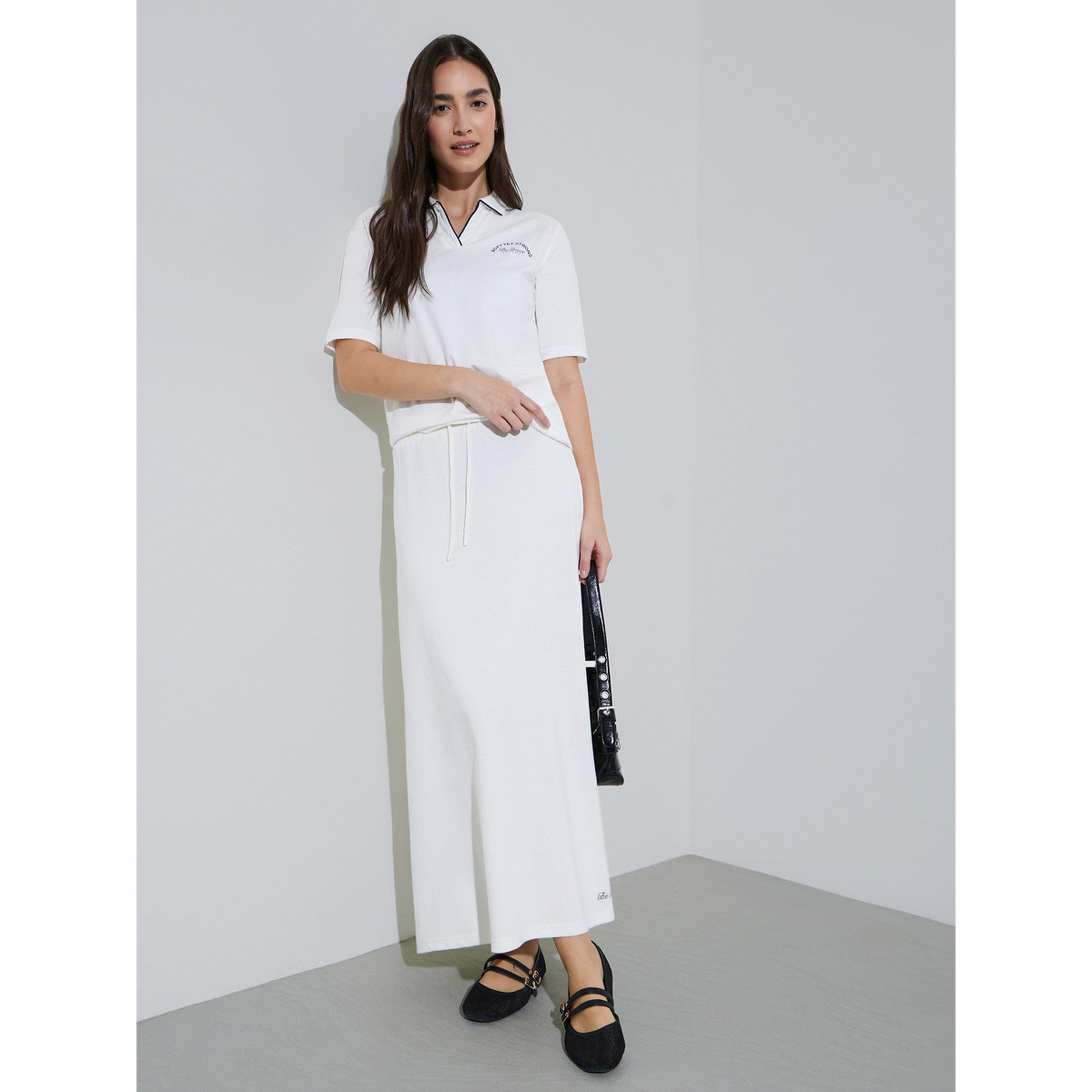 تيشيرت بولو بطبعة شعار وحواف مُتباينة-women-clothing-tshirts-image-2