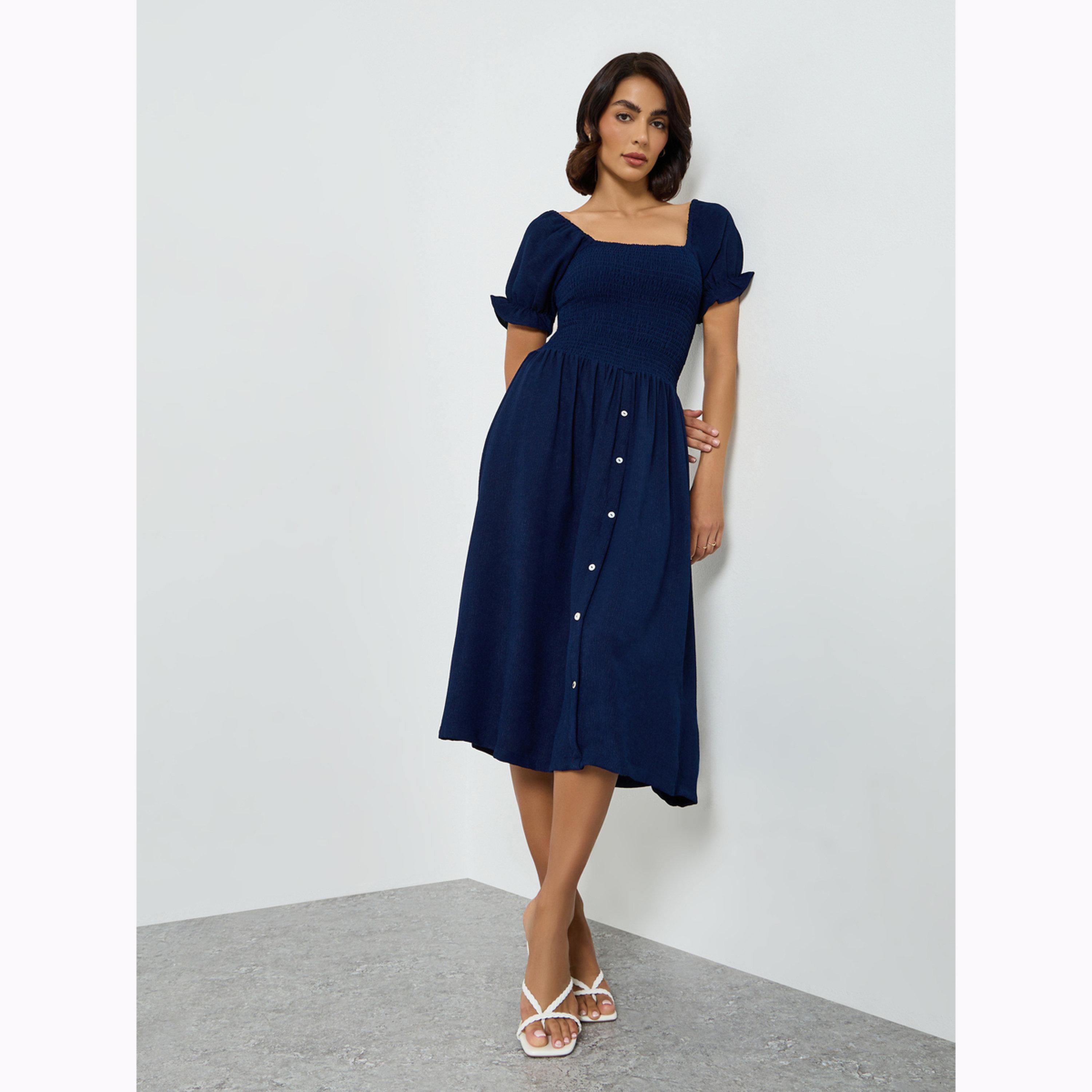 فستان بطول الركبة بتفاصيل مزمومة-women-clothing-dresses-image-3
