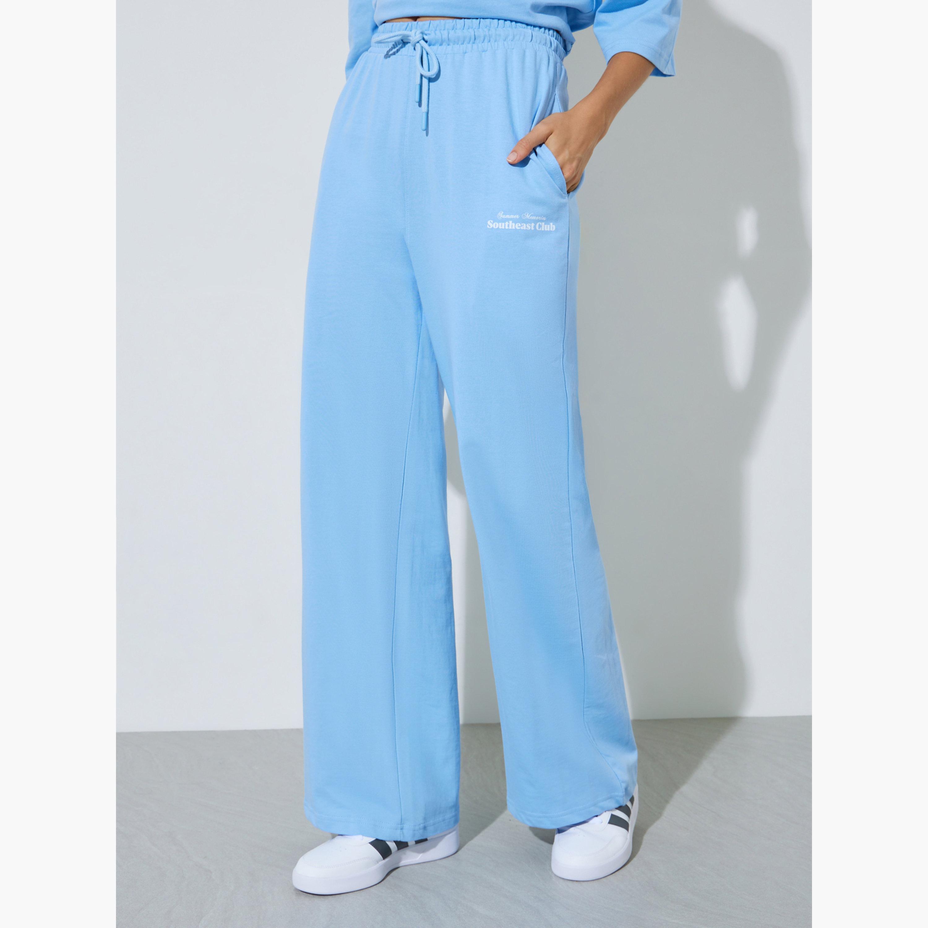 جوغر قطن بأرجل واسعة لون أزرق فاتح-women-clothing-bottoms-joggers-image-1