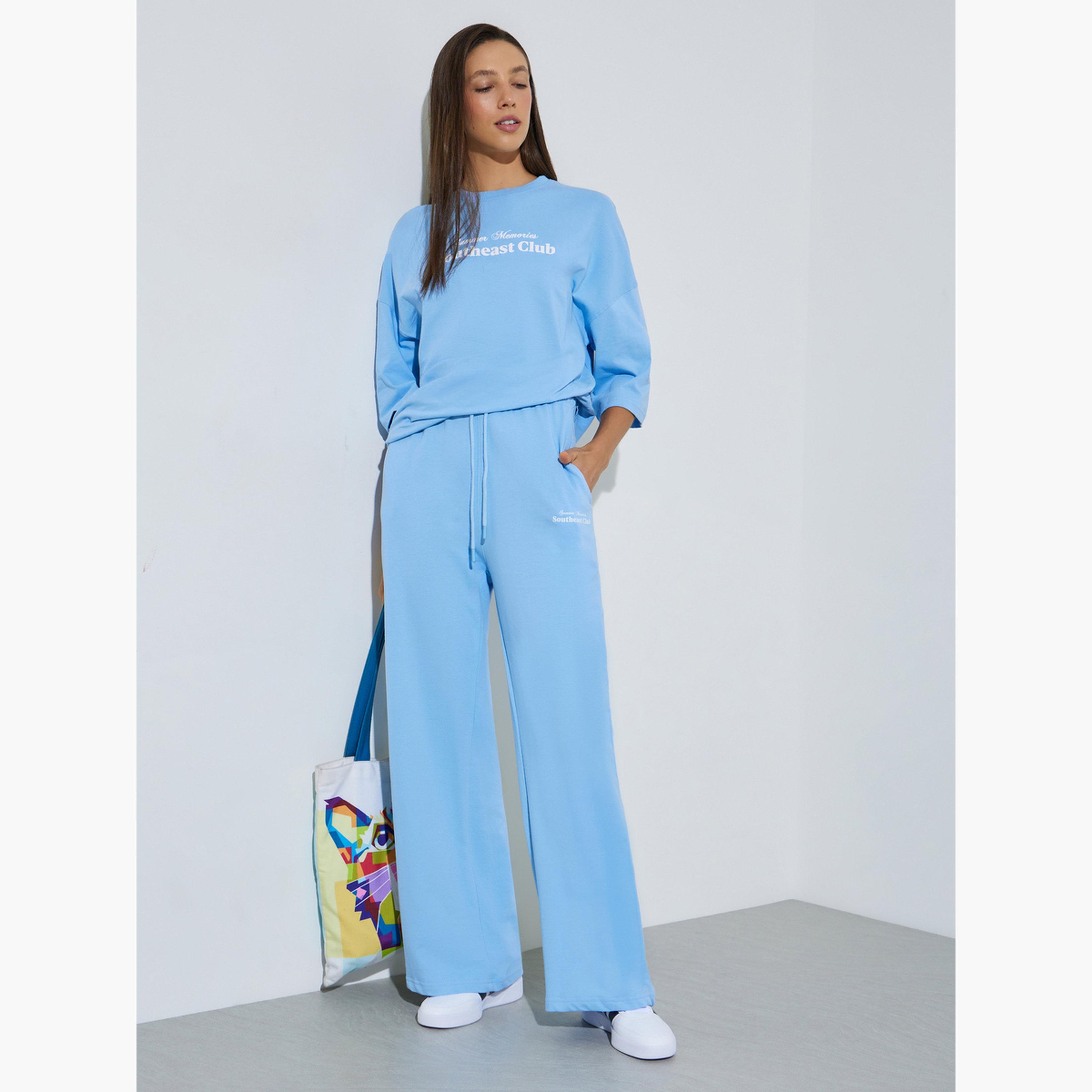 جوغر قطن بأرجل واسعة لون أزرق فاتح-women-clothing-bottoms-joggers-image-2