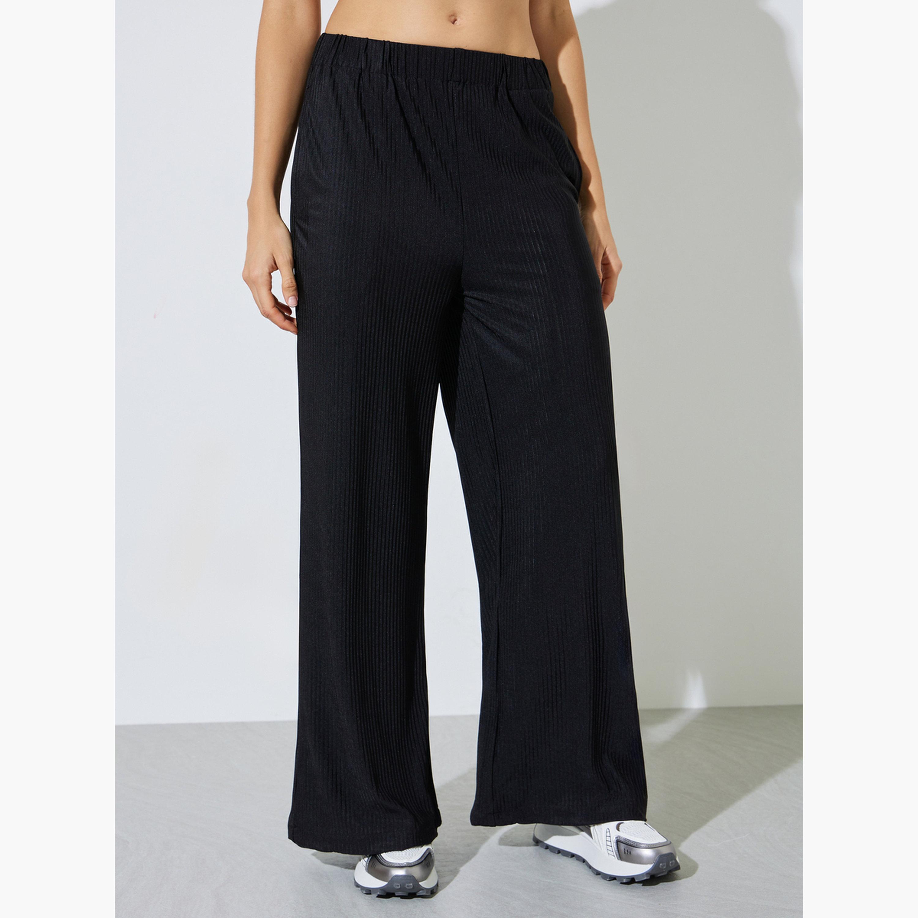 بنطال بأرجل واسعة وقماش بليسه-women-clothing-bottoms-joggers-image-1