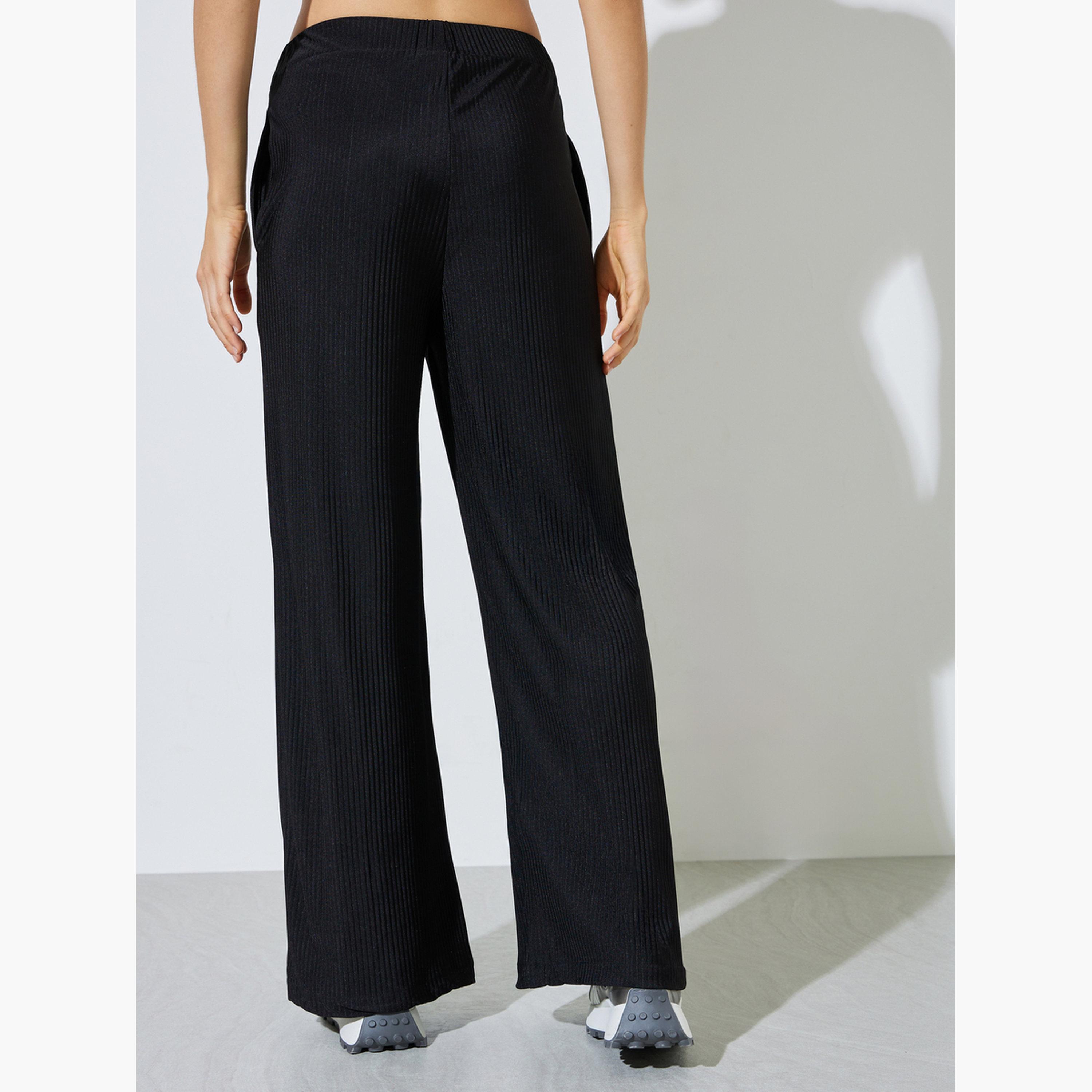 بنطال بأرجل واسعة وقماش بليسه-women-clothing-bottoms-joggers-image-4