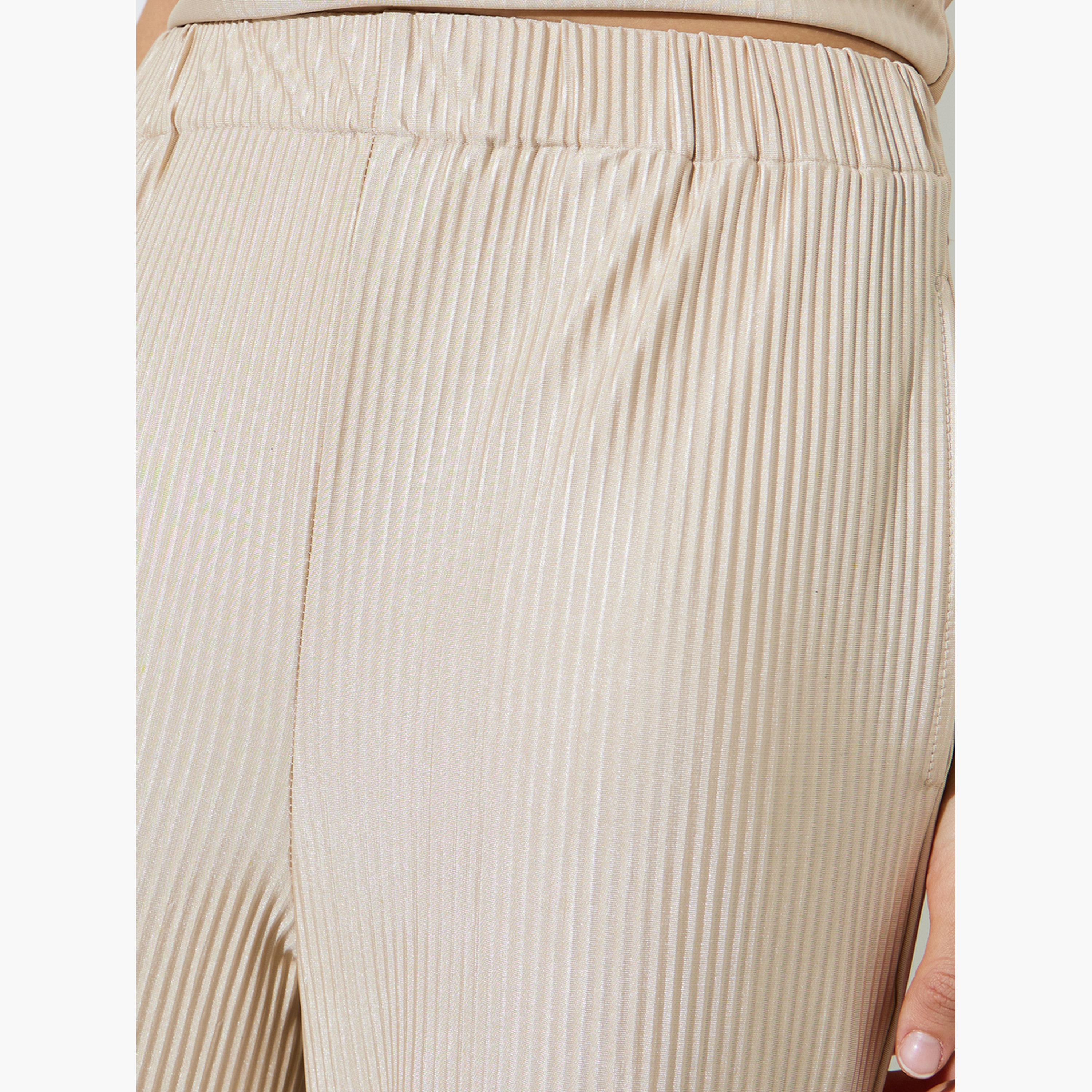 بنطال بأرجل واسعة وقماش بليسه بيج-women-clothing-bottoms-joggers-image-3