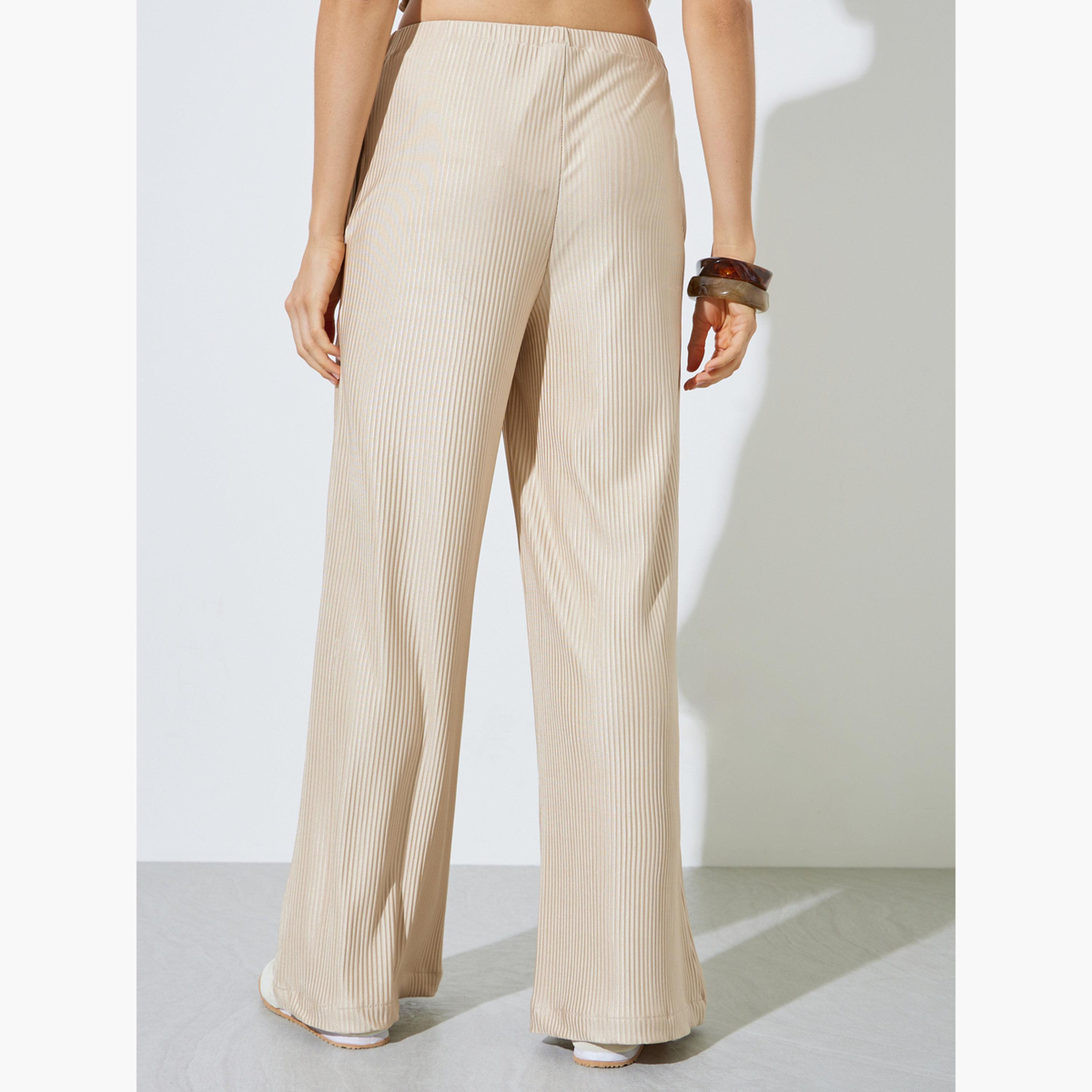 بنطال بأرجل واسعة وقماش بليسه بيج-women-clothing-bottoms-joggers-image-4
