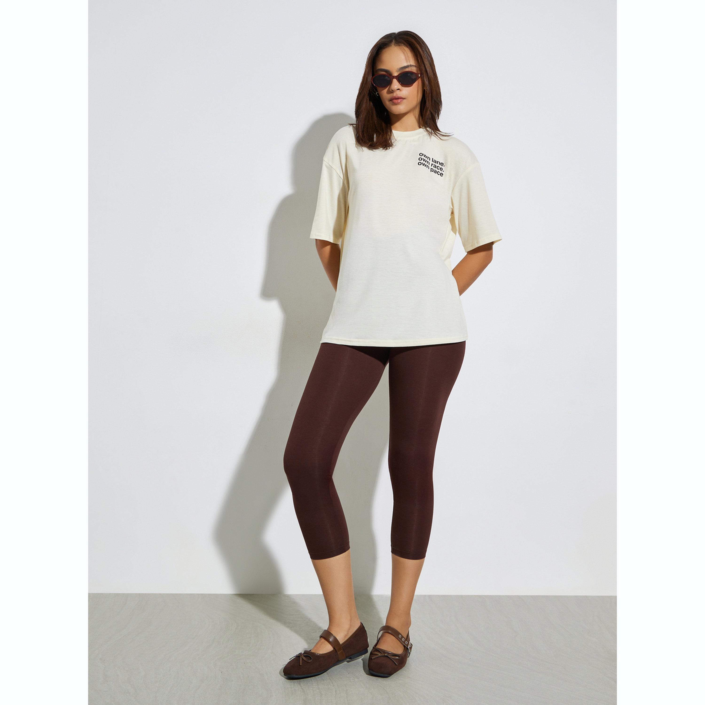 تيشيرت بقصة فضفاضة وطبعة شعار-women-clothing-tshirts-image-2