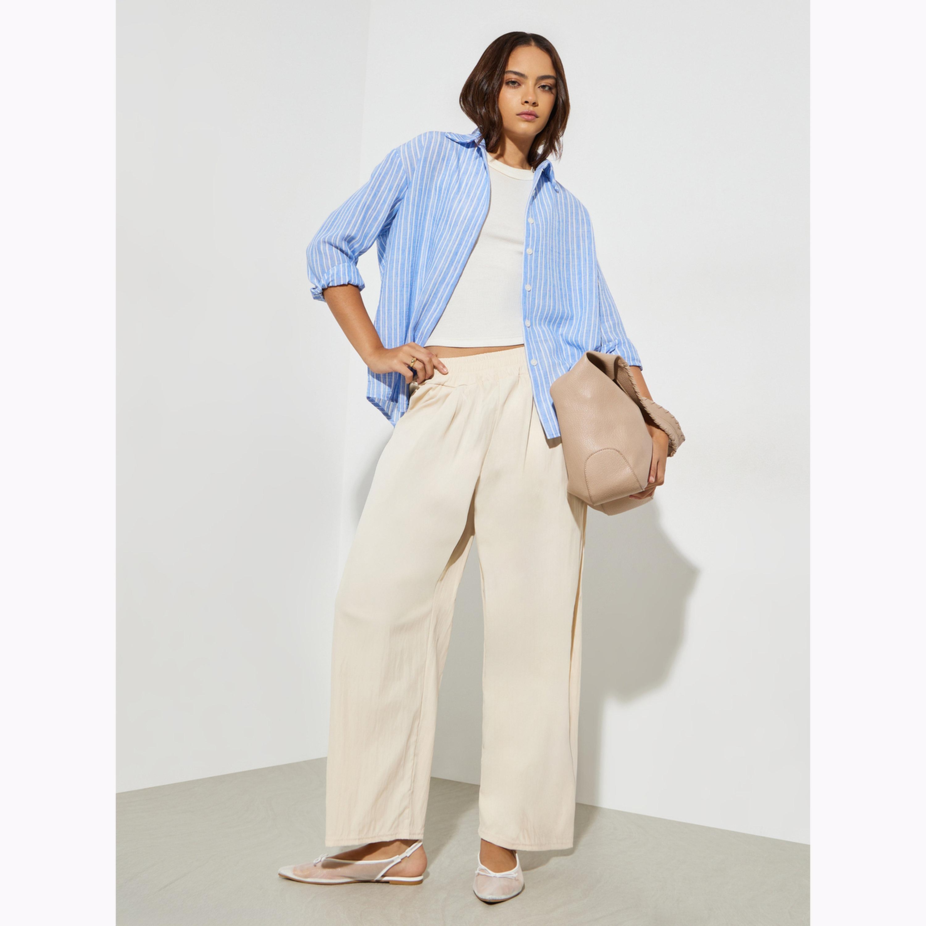 بنطال بأرجل واسعة وجيب بلون كريمي-women-clothing-bottoms-joggers-image-2