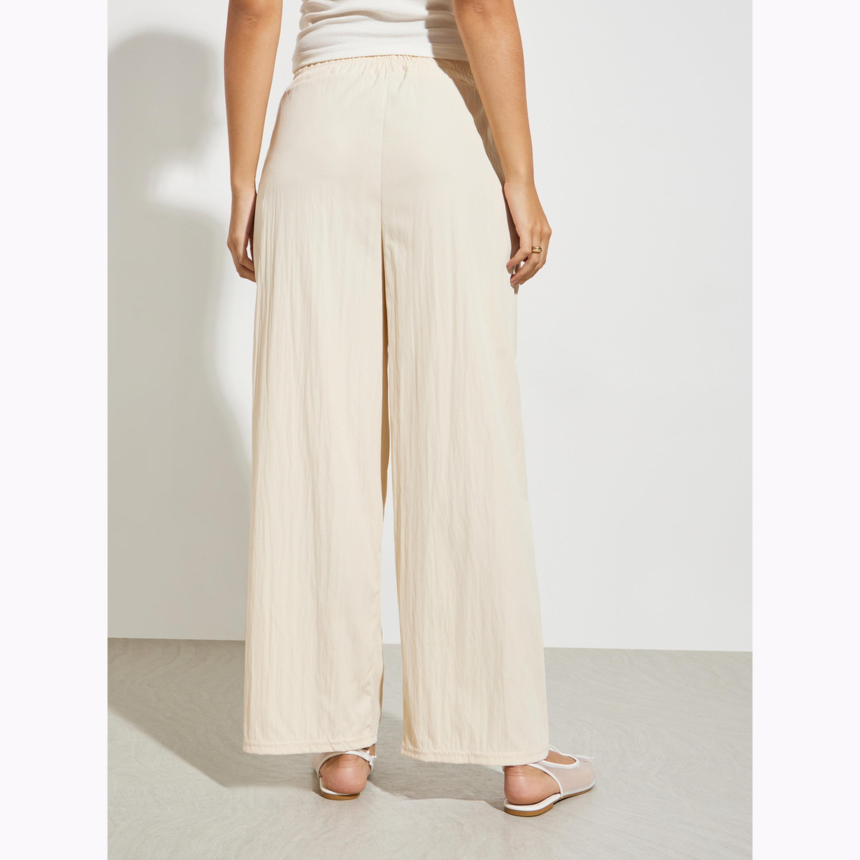Styli Cream Solid Wide Leg Pants with Pocket-women-clothing-bottoms-joggers-image-5