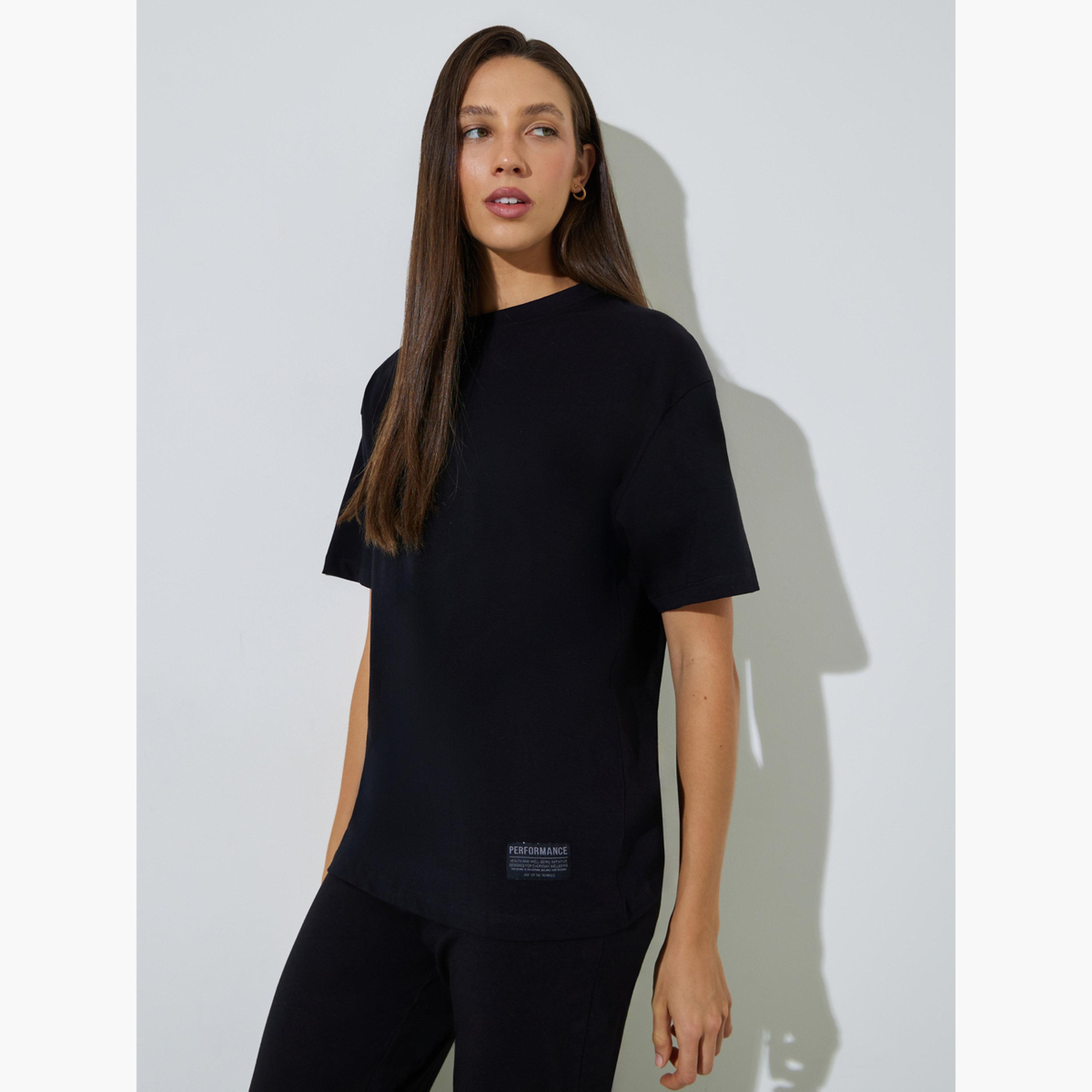 Styli Black Badge Detail T-Shirt and Flared Leggings Co-Ords-women-clothing-coordsets-image-2