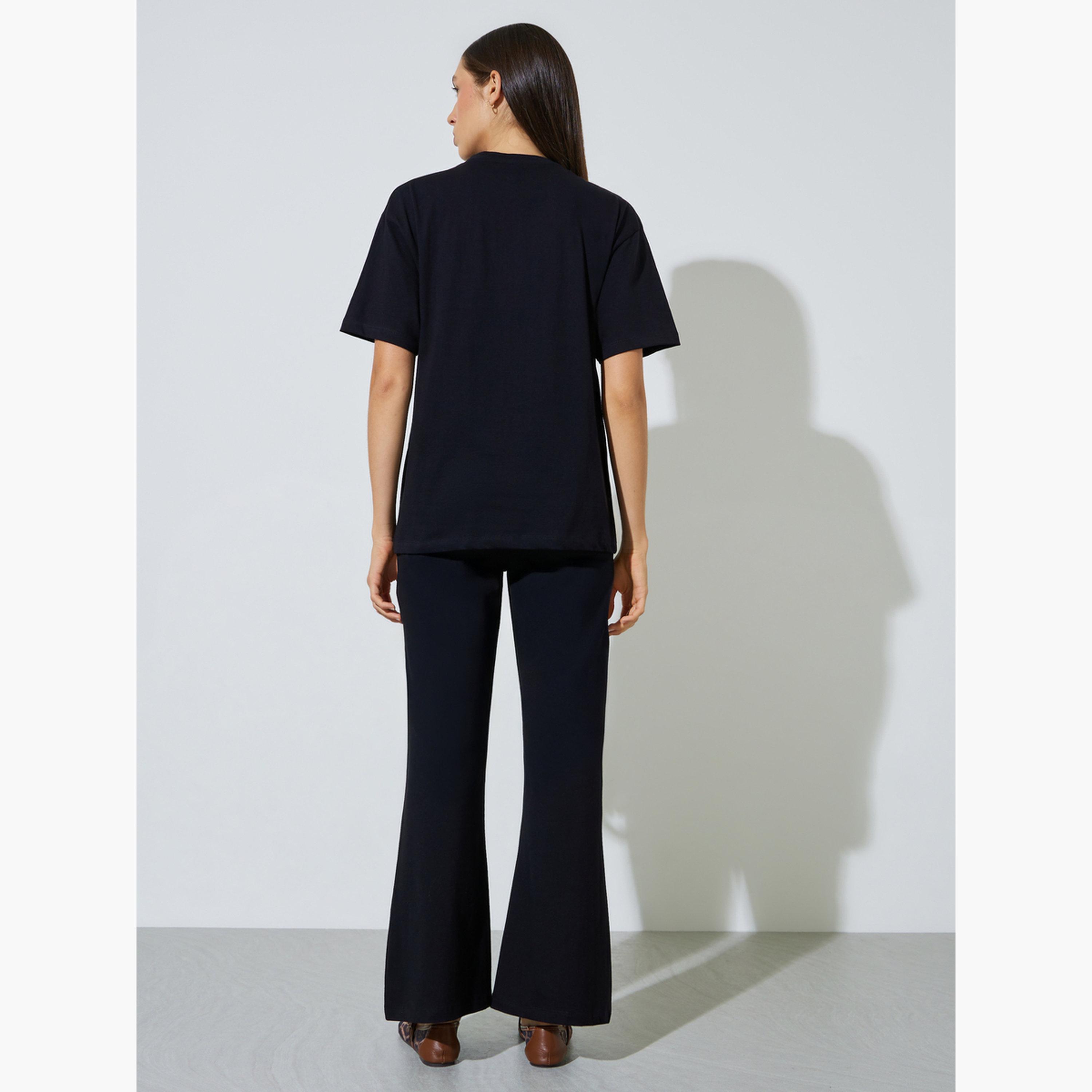 Styli Black Badge Detail T-Shirt and Flared Leggings Co-Ords-women-clothing-coordsets-image-4
