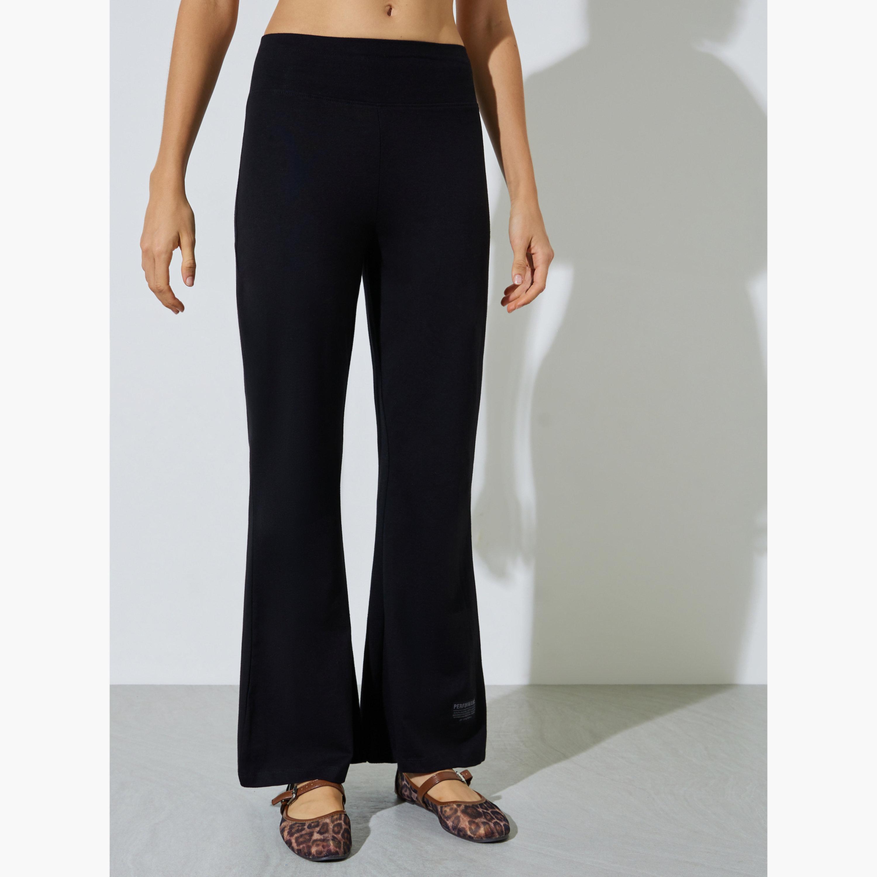 Styli Black Badge Detail T-Shirt and Flared Leggings Co-Ords-women-clothing-coordsets-image-5