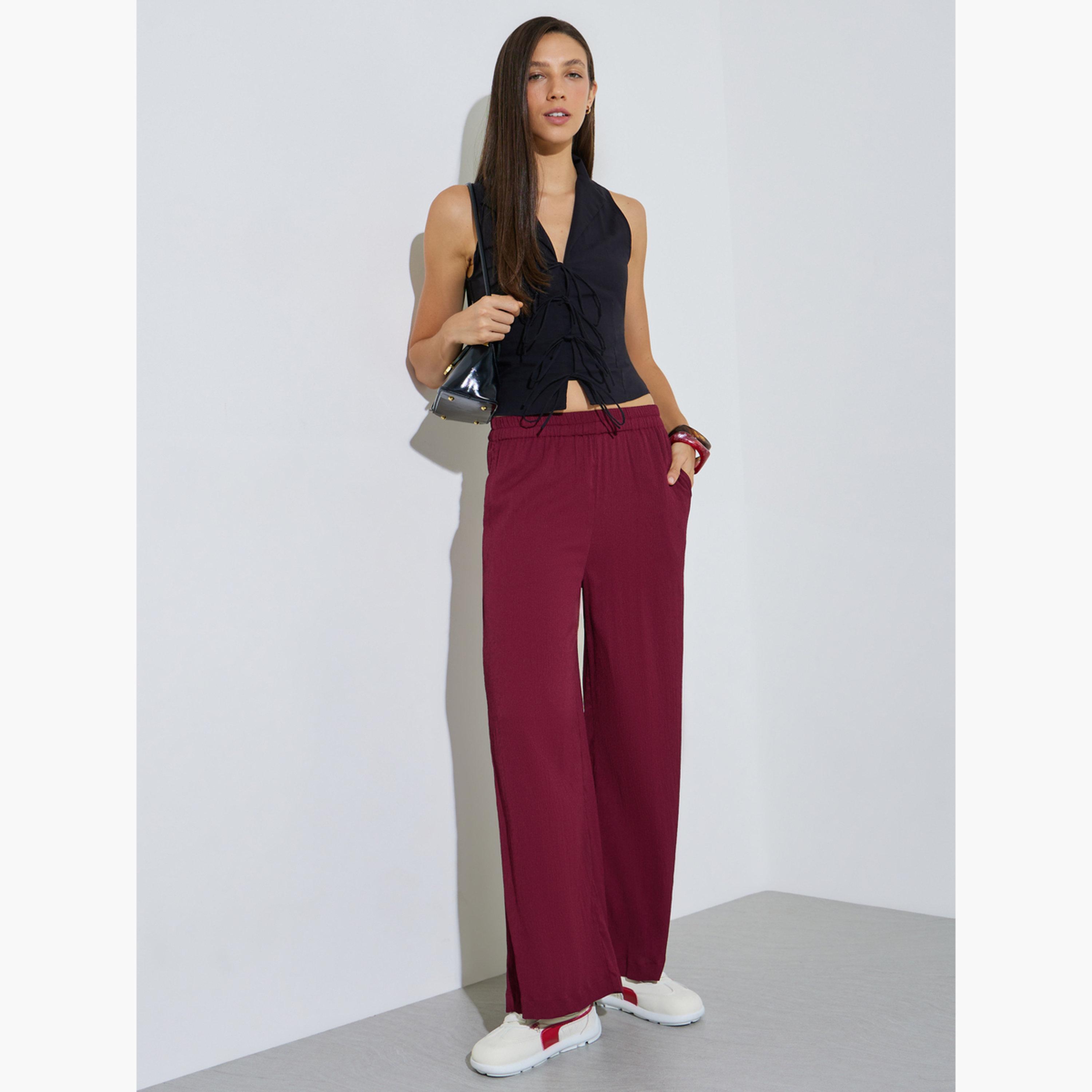 بنطال بأرجل واسعة وخصر مطاطي-women-clothing-bottoms-joggers-image-2