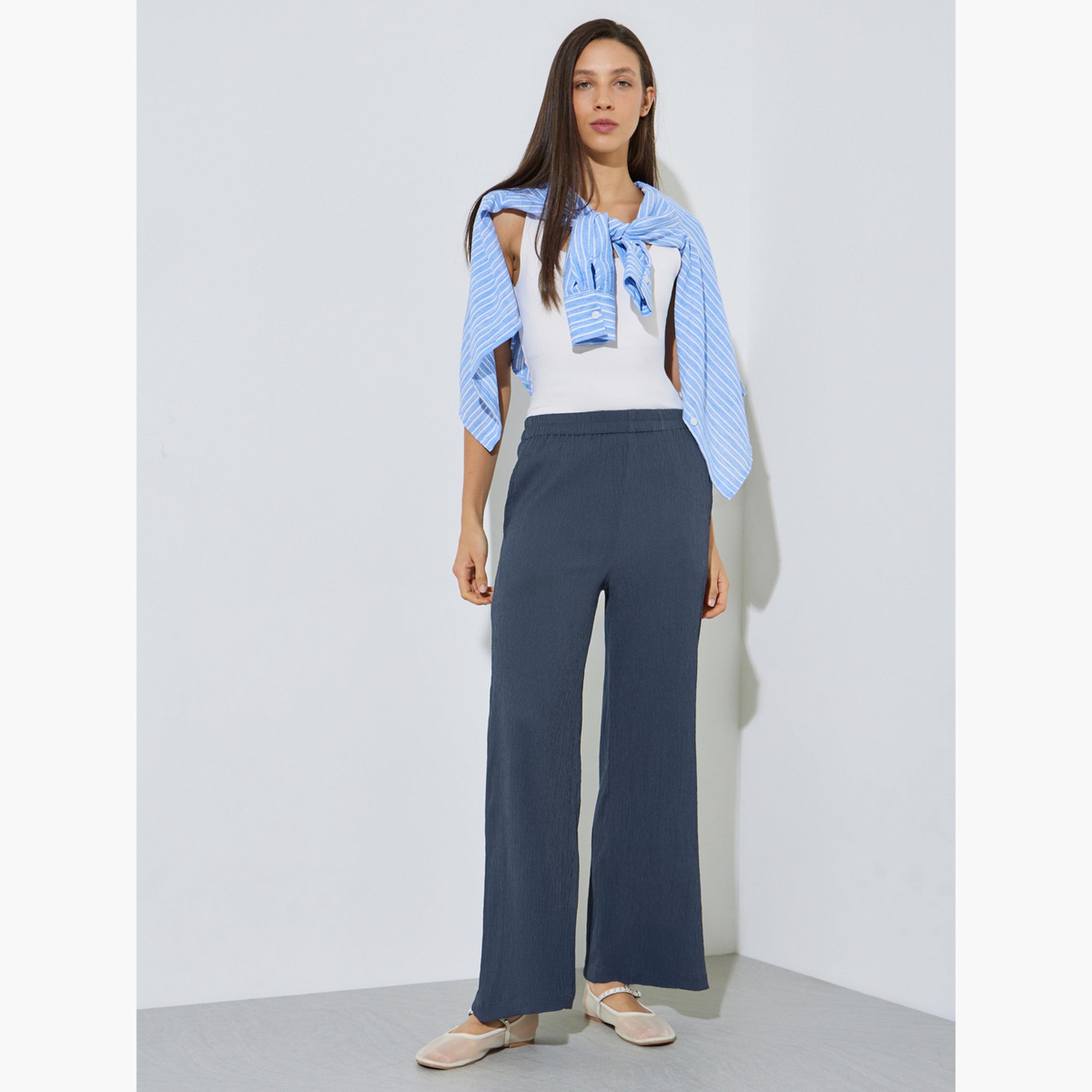 بنطال بأرجل واسعة وخصر مطاطي-women-clothing-bottoms-joggers-image-2