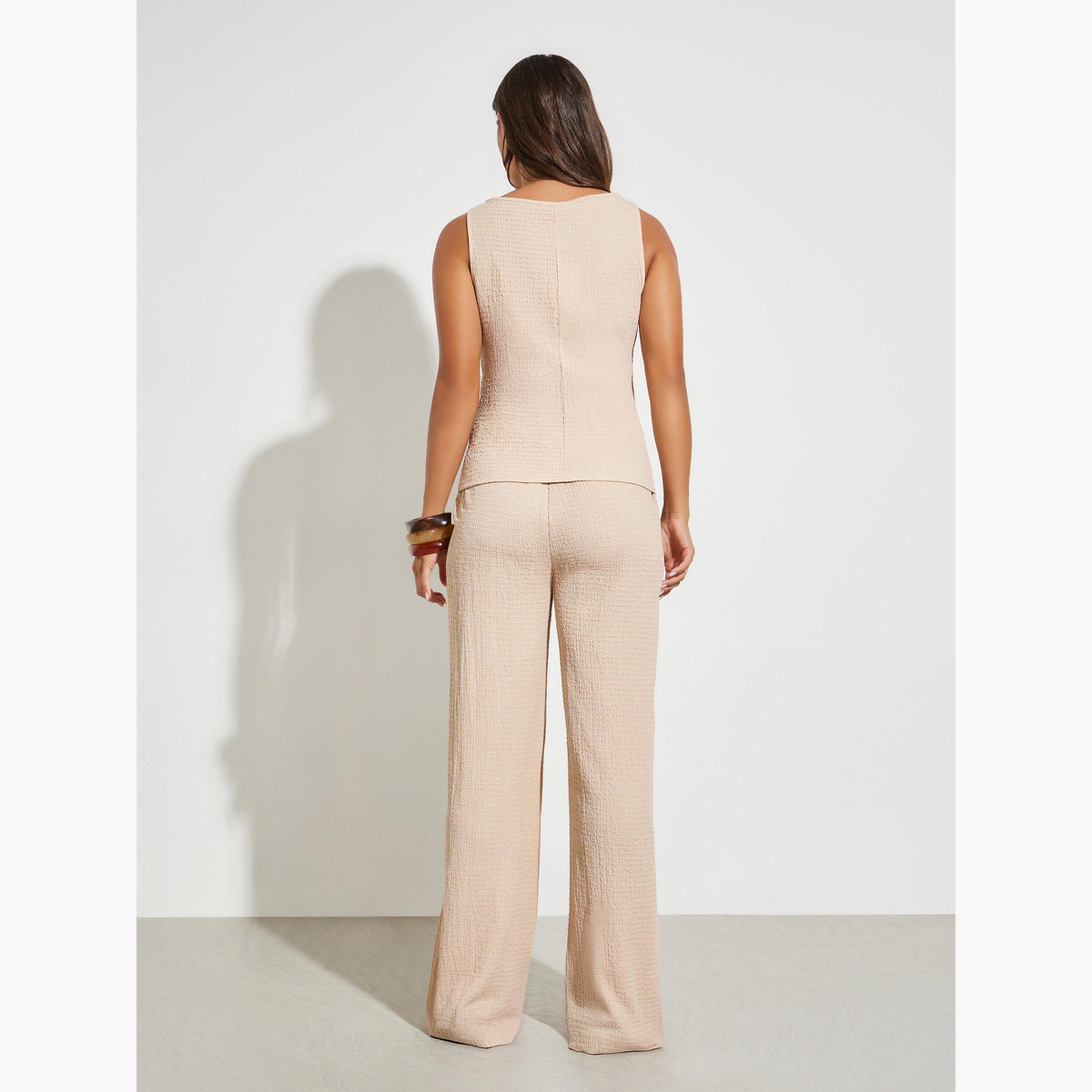 طقم منسق من بنطال بأرجل واسعة وبلوزة بتفاصيل بارزة الملمس بلون بيج-women-clothing-coordsets-image-3