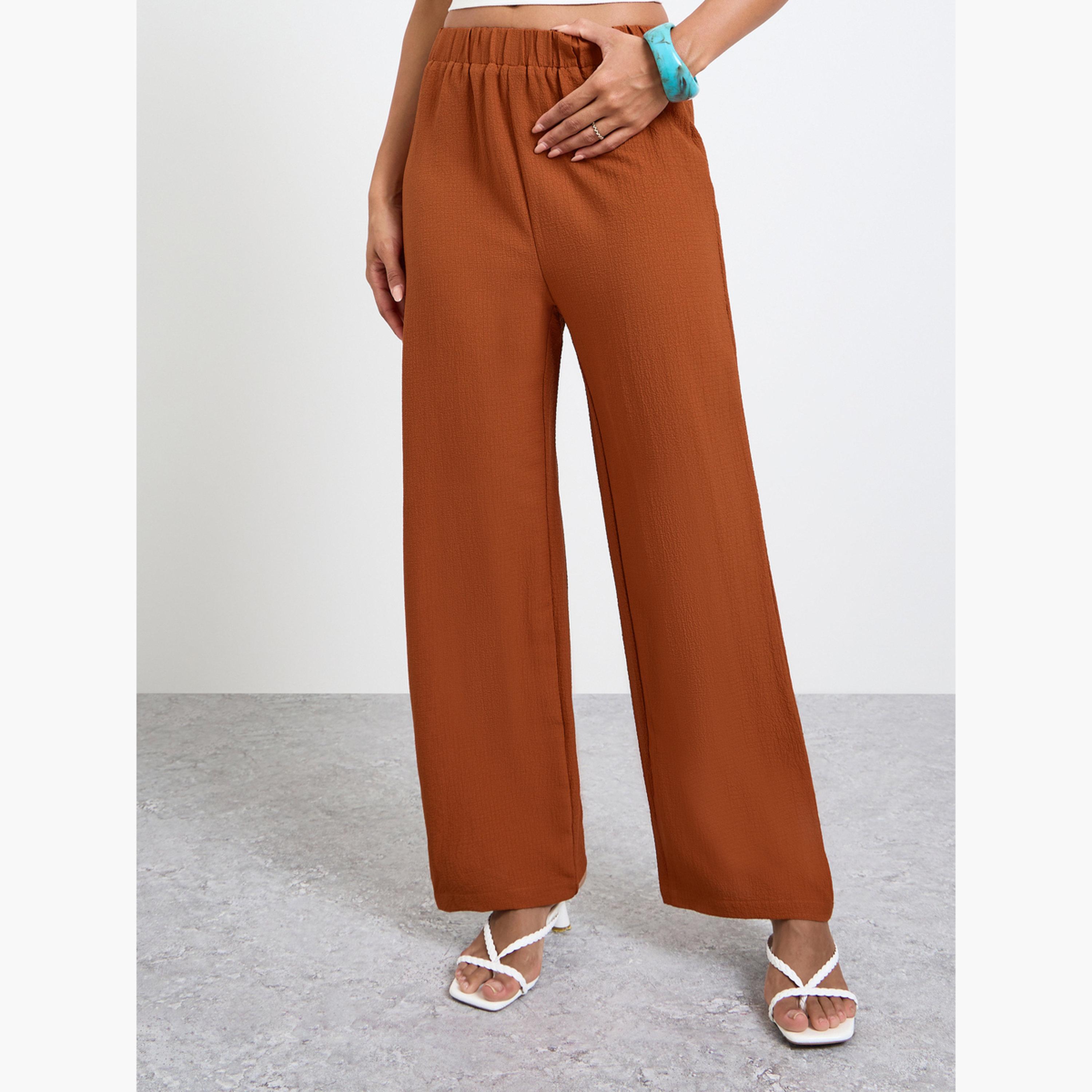 بنطال بأرجل واسعة وخصر مطاطي بلون صدئي-women-clothing-bottoms-joggers-image-1