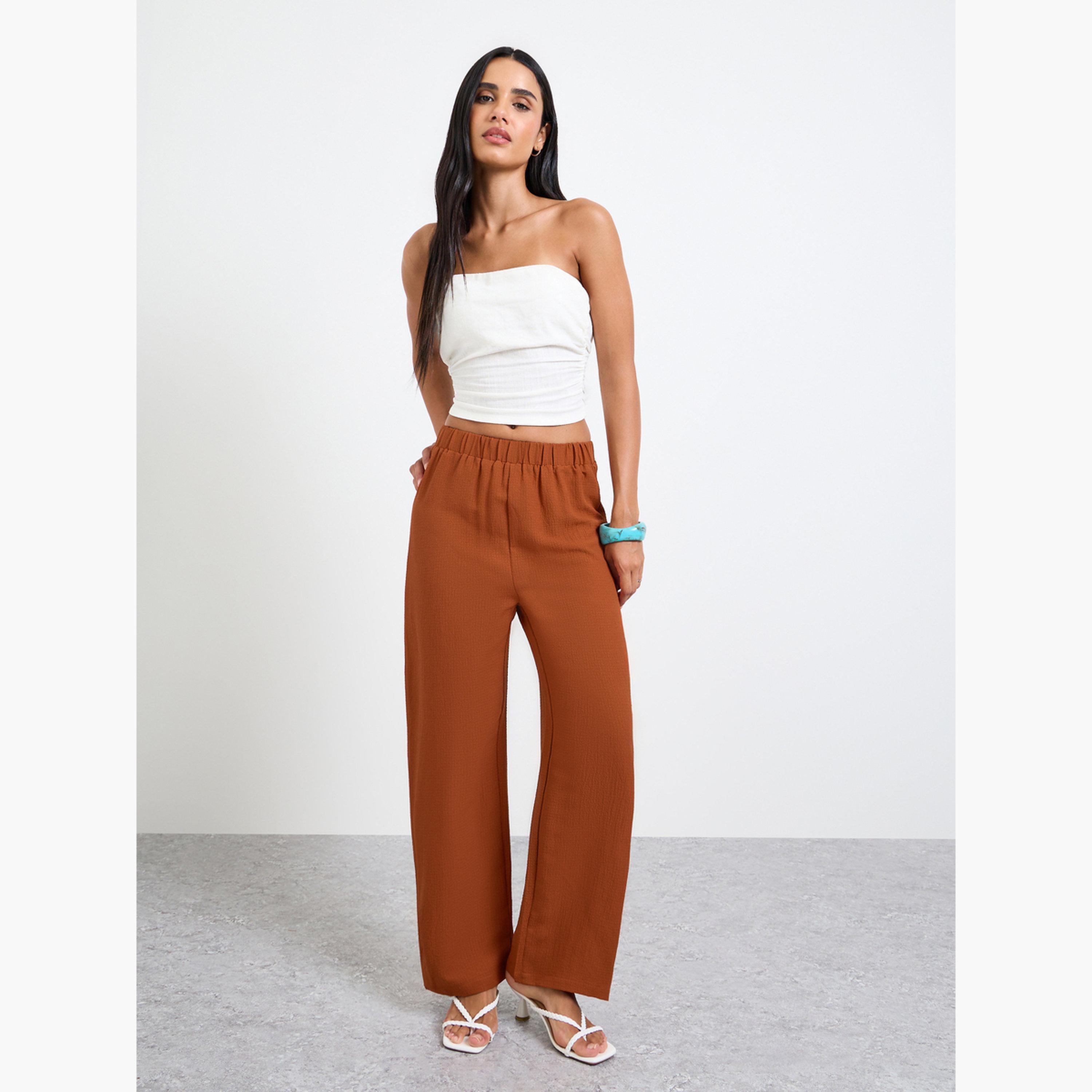 بنطال بأرجل واسعة وخصر مطاطي بلون صدئي-women-clothing-bottoms-joggers-image-2