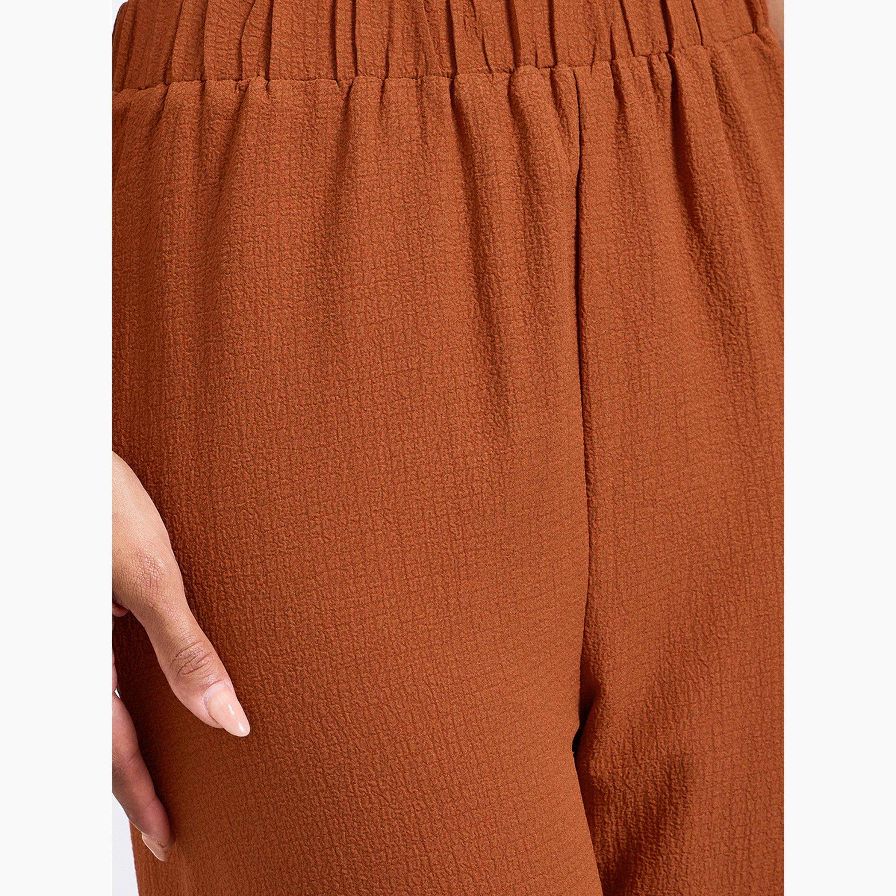 بنطال بأرجل واسعة وخصر مطاطي بلون صدئي-women-clothing-bottoms-joggers-image-3