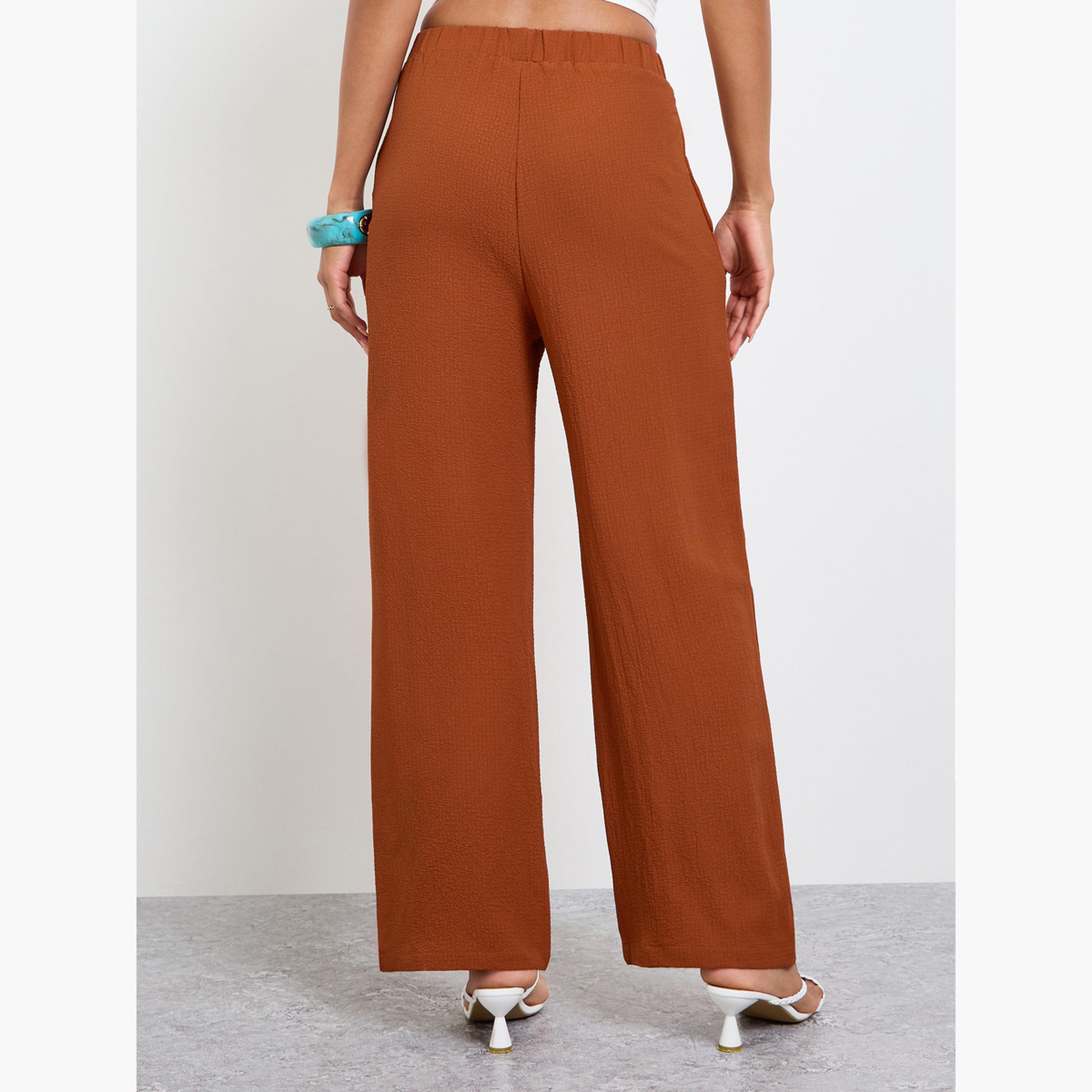 بنطال بأرجل واسعة وخصر مطاطي بلون صدئي-women-clothing-bottoms-joggers-image-4